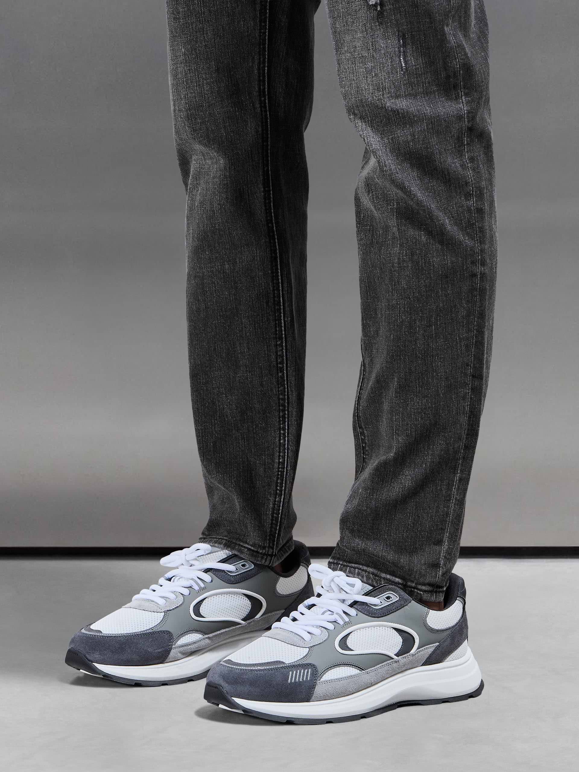 Distressed Denim Jeans in Grey Wash