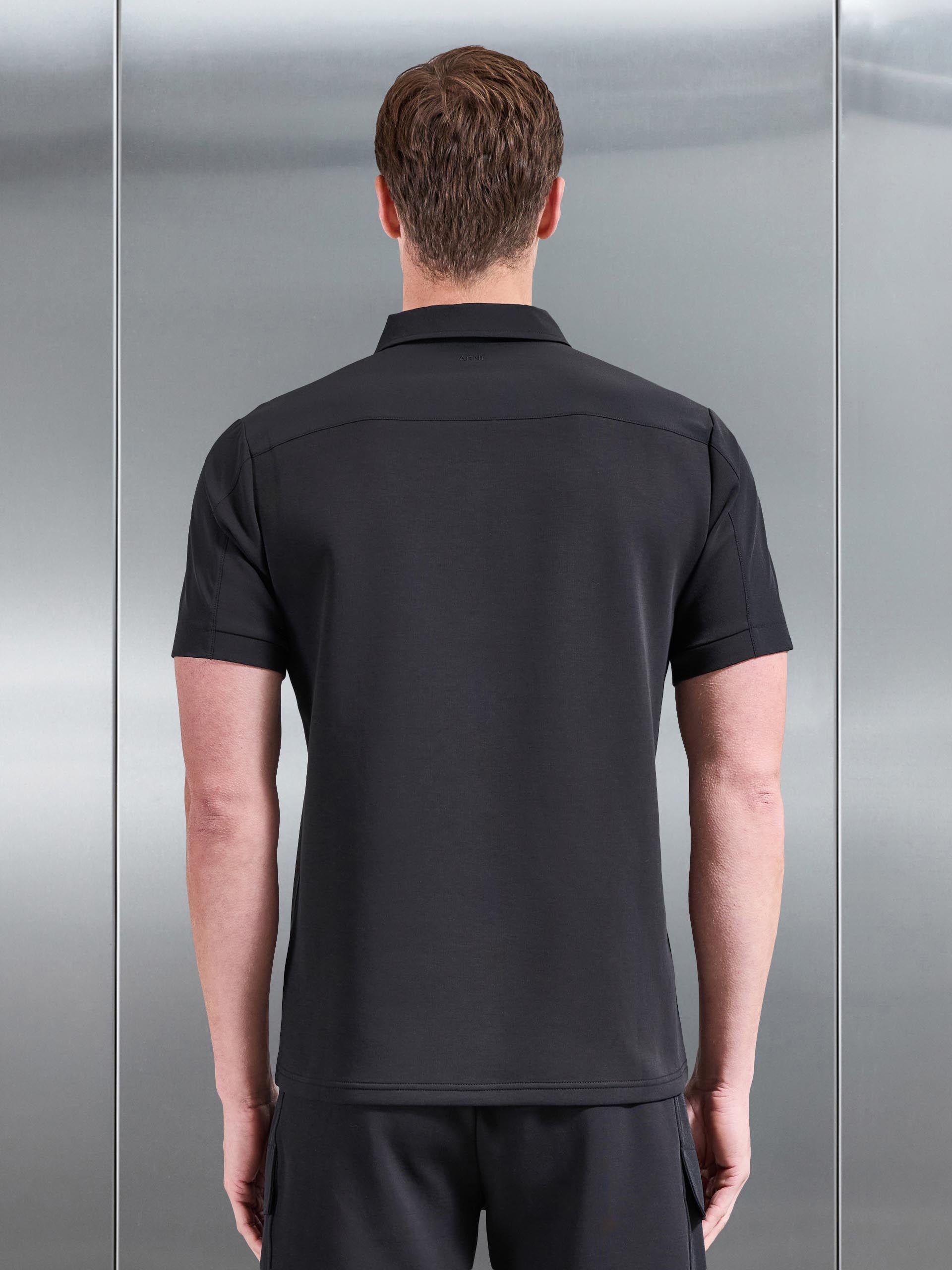 Mens Hybrid Cargo Zip Polo Shirt in Black