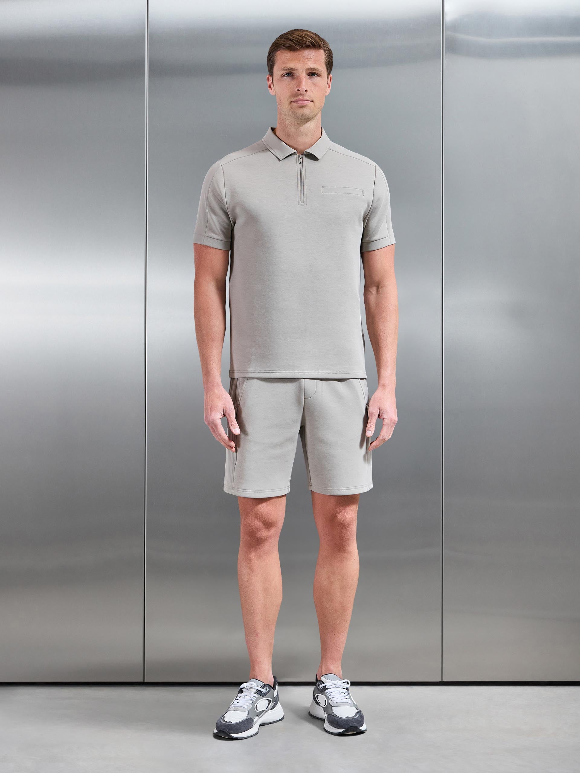 Mens Hybrid Cargo Zip Polo Shirt in Stone