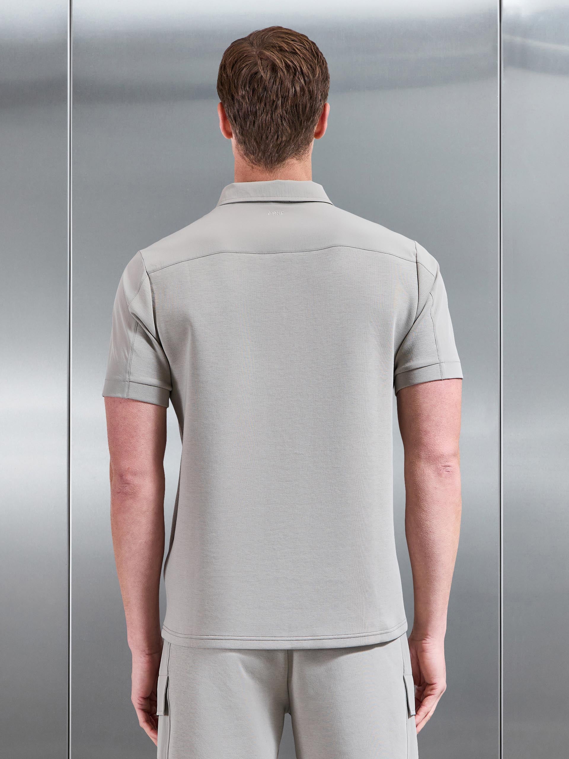 Mens Hybrid Cargo Zip Polo Shirt in Stone