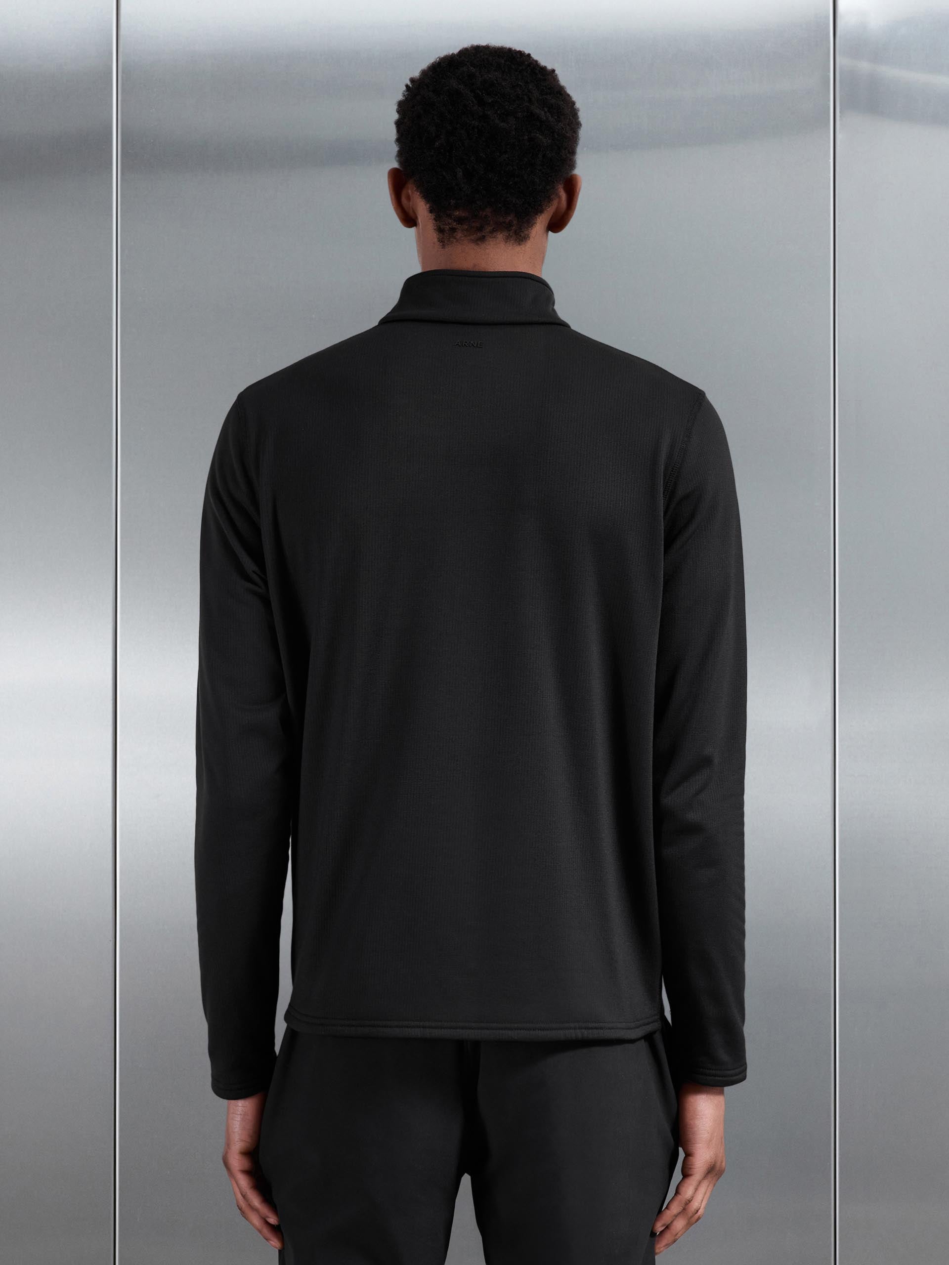 Mens Insulating Golf Mid Layer in Black