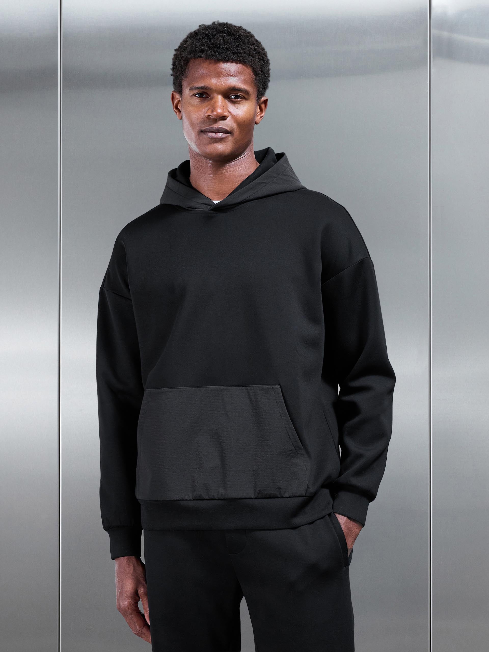 Mens Interlock Jersey Hybrid Relaxed Hoodie in Black