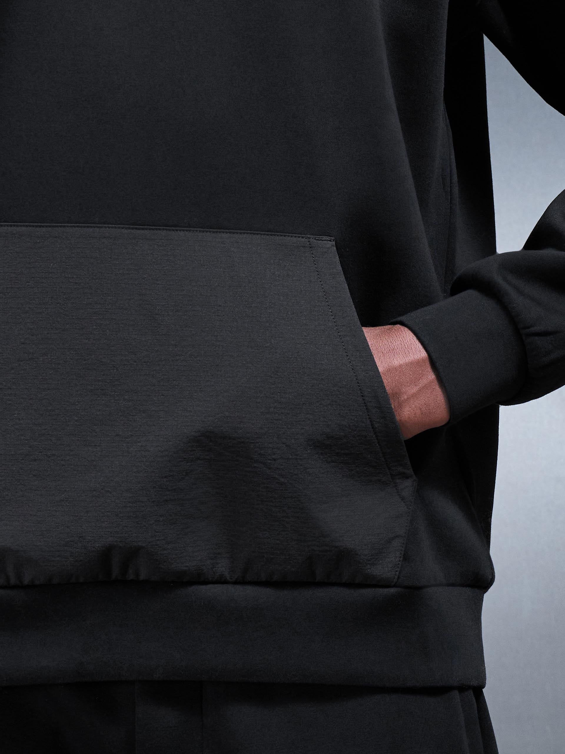 Mens Interlock Jersey Hybrid Relaxed Hoodie in Black
