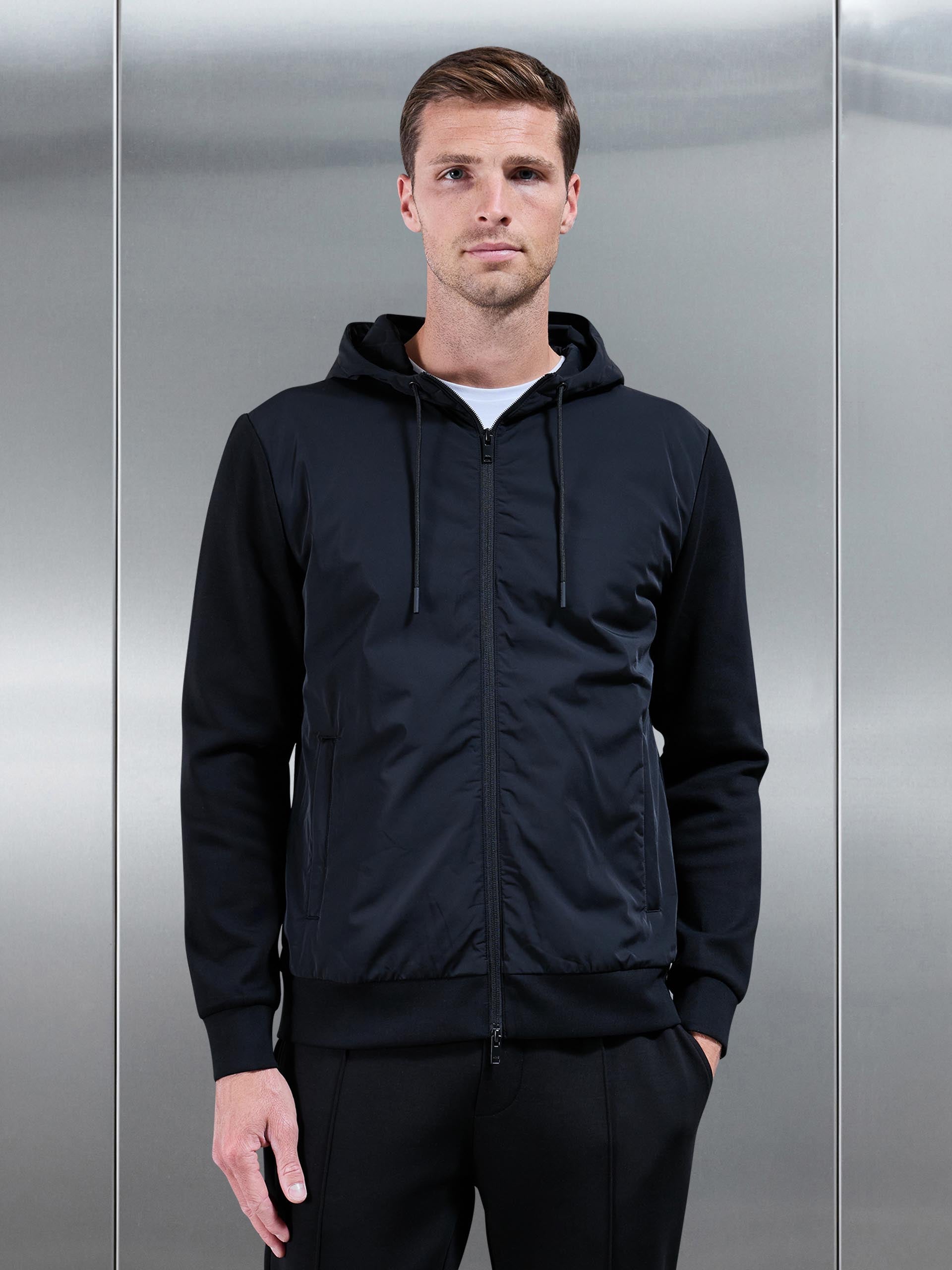 Mens Interlock Jersey Hybrid Technical Windbreaker in Black