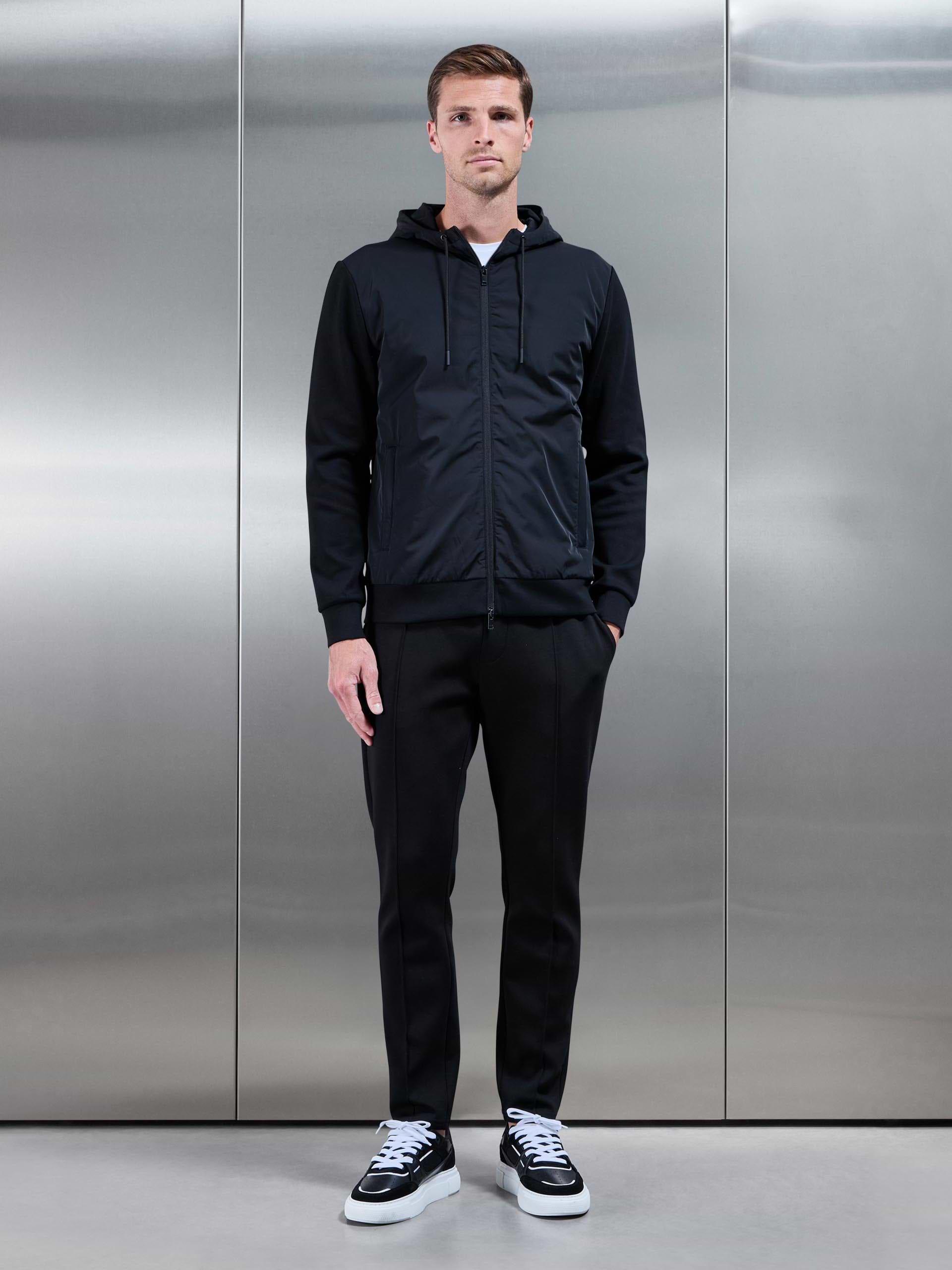 Mens Interlock Jersey Hybrid Technical Windbreaker in Black
