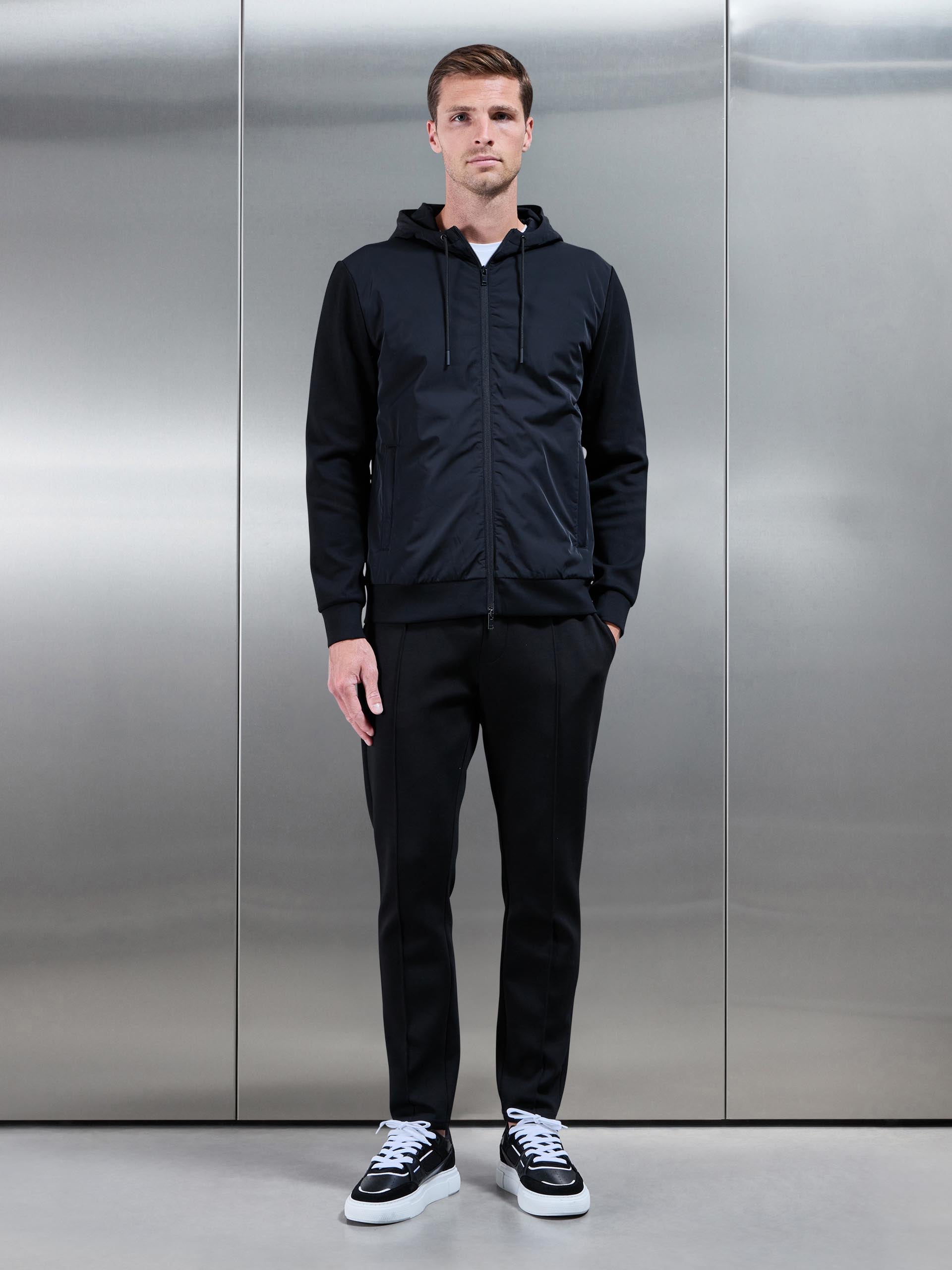 Mens Interlock Jersey Hybrid Technical Windbreaker in Black