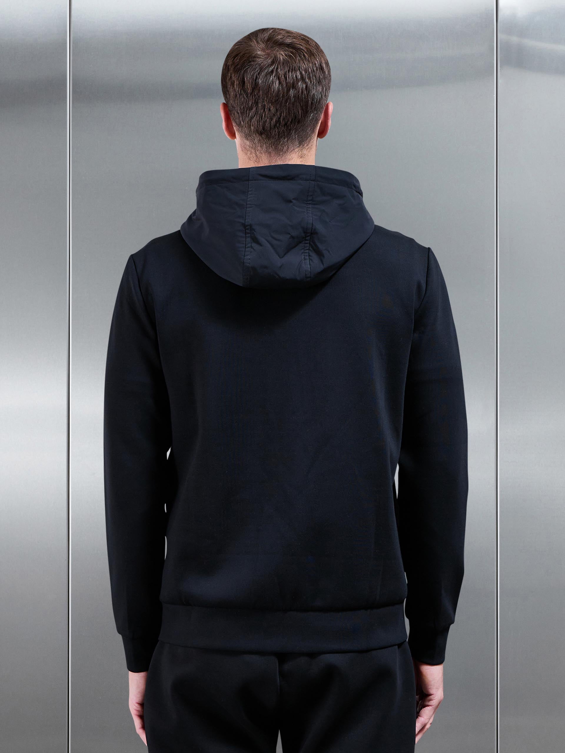 Mens Interlock Jersey Hybrid Technical Windbreaker in Black