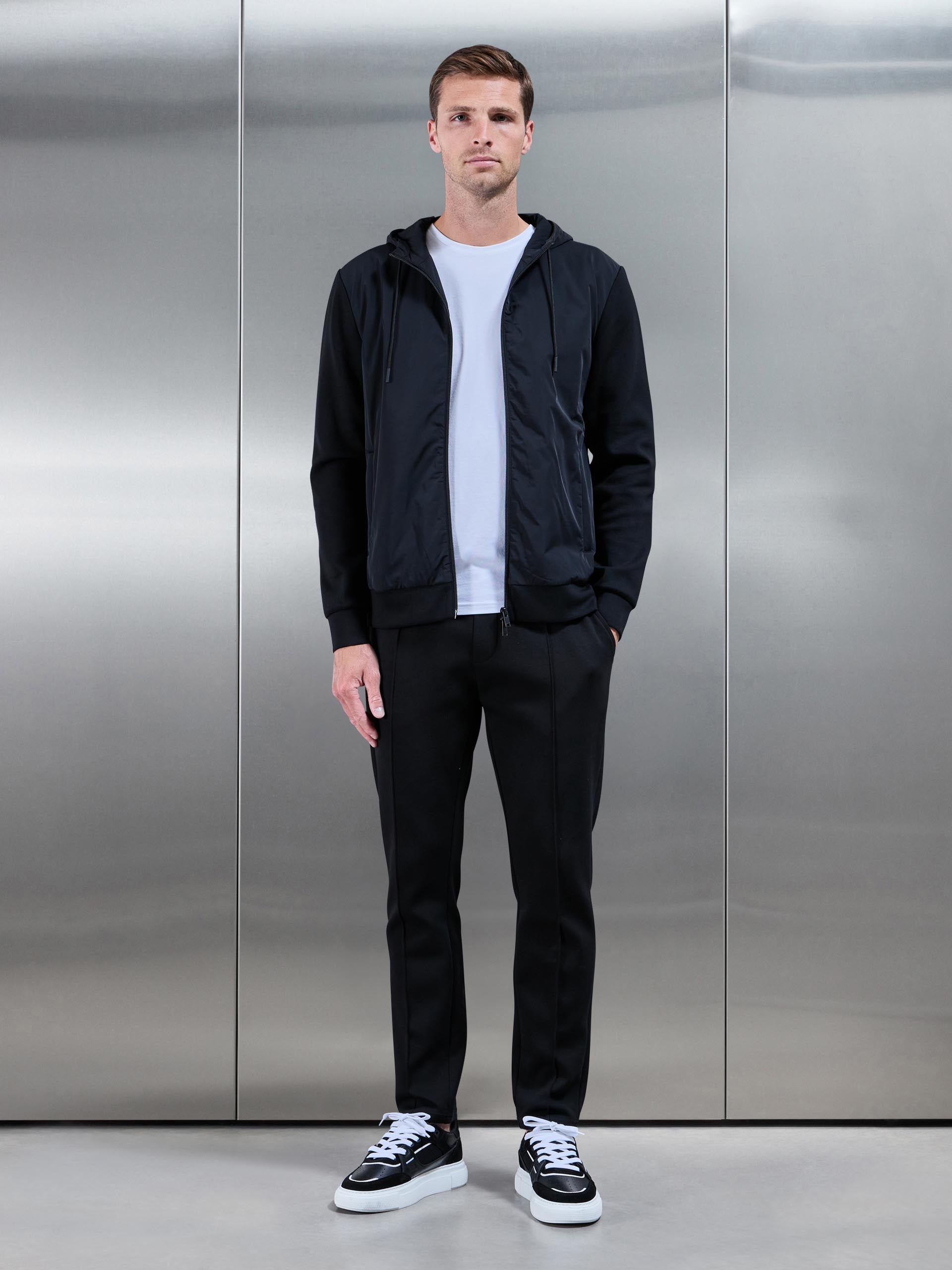Mens Interlock Jersey Hybrid Technical Windbreaker in Black