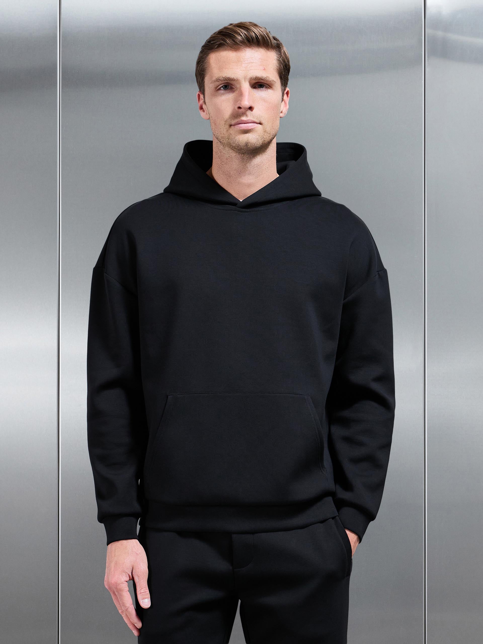 Mens Interlock Jersey Relaxed Fit Hoodie in Black