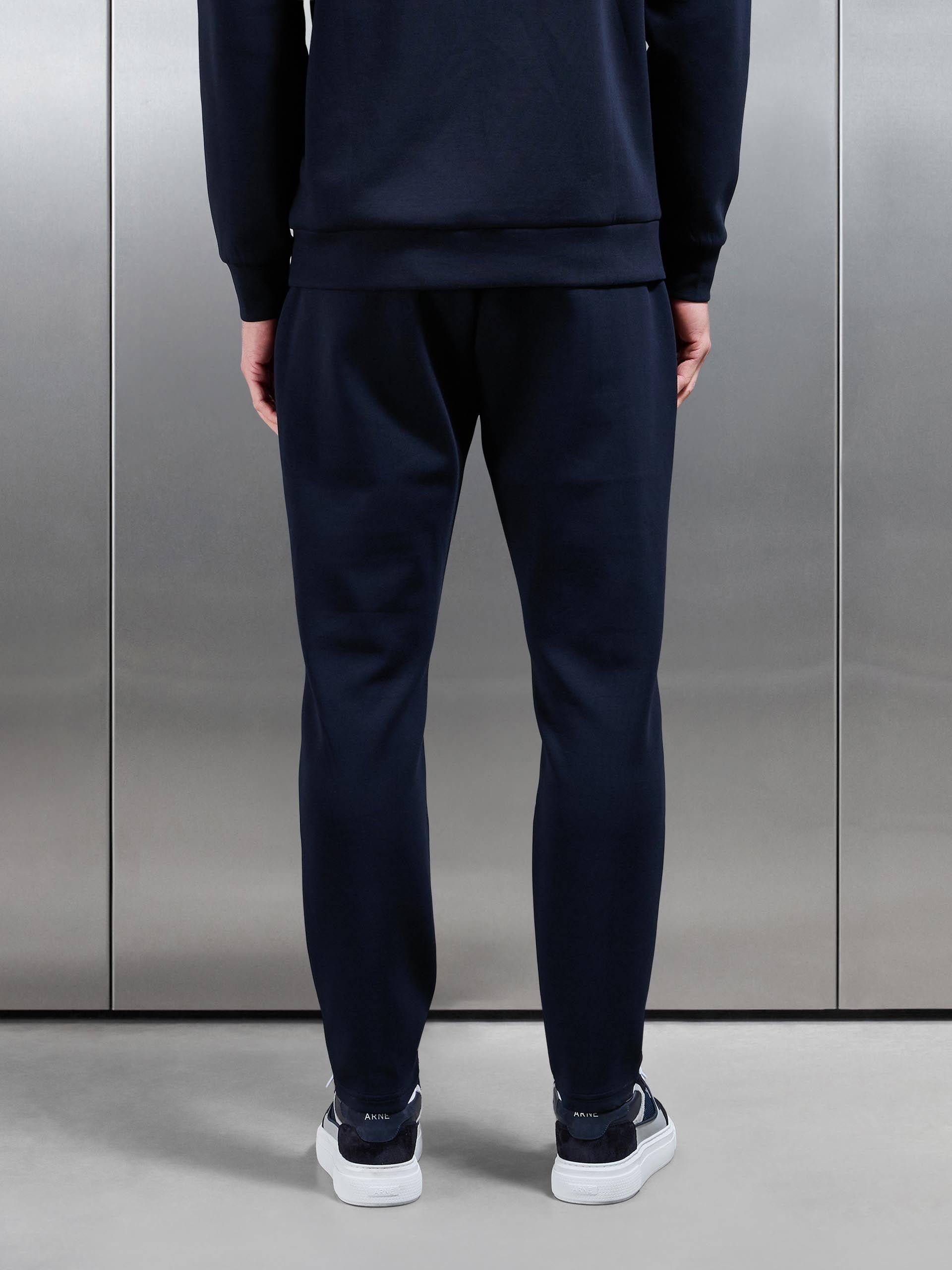 Mens Interlock Jersey Tapered Jogger in Navy