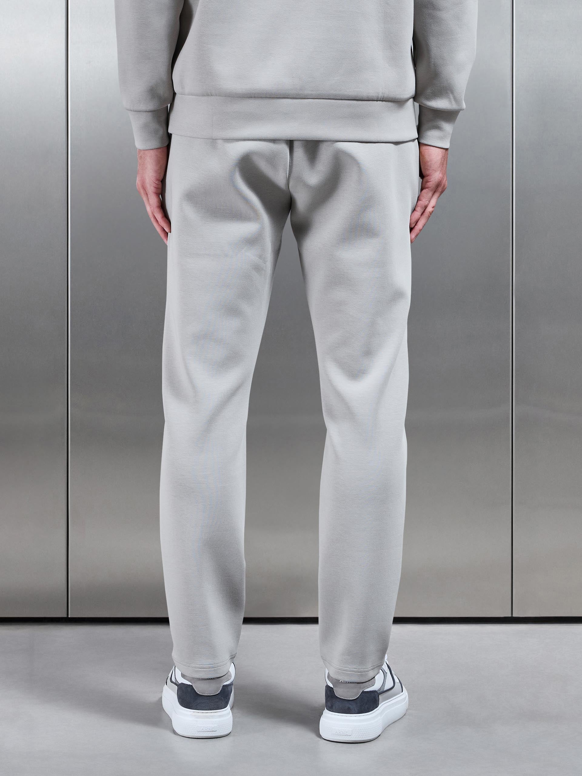 Mens Interlock Jersey Tapered Jogger in Stone