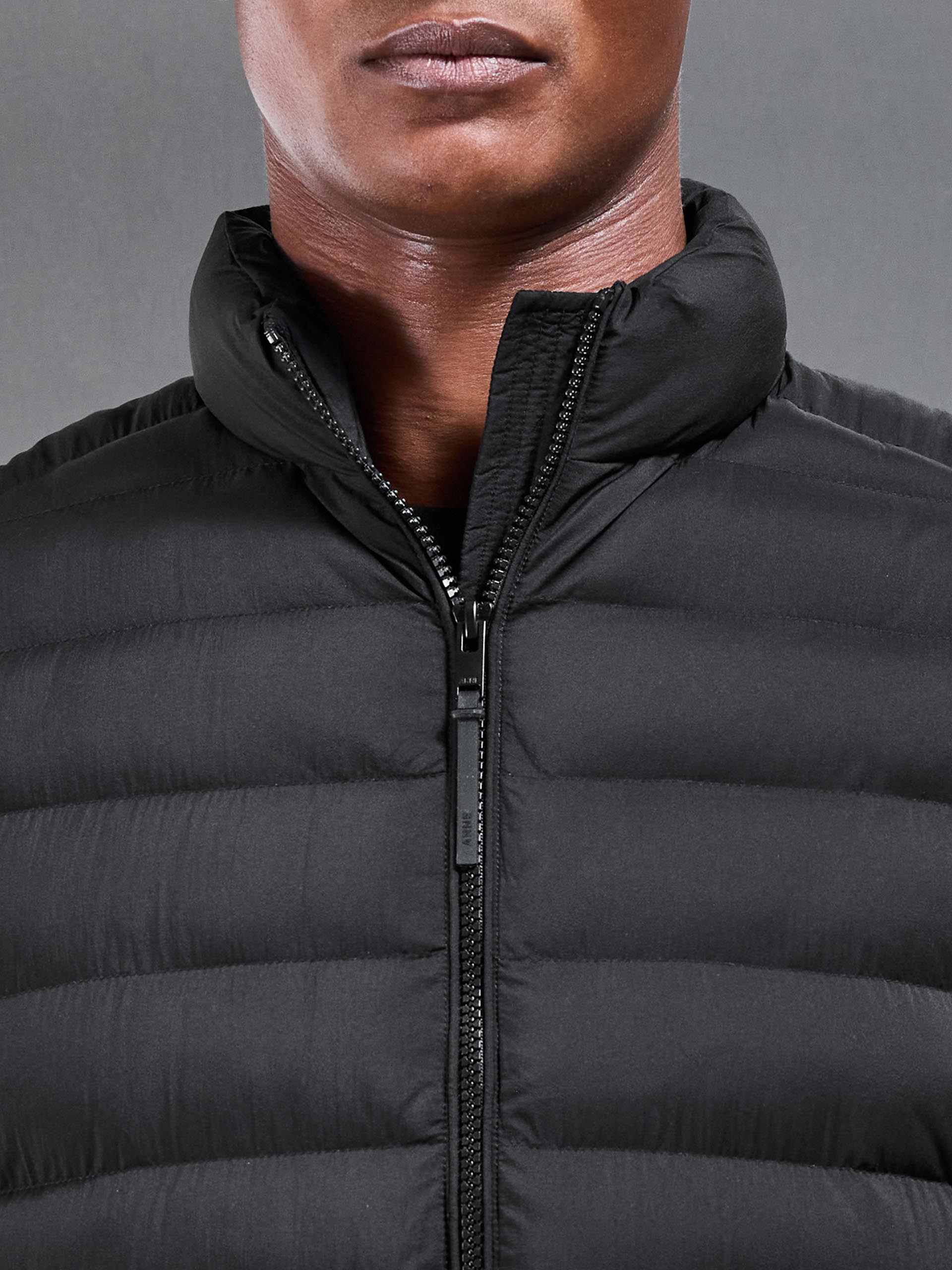 Mens Technical Puffer Gilet in Black