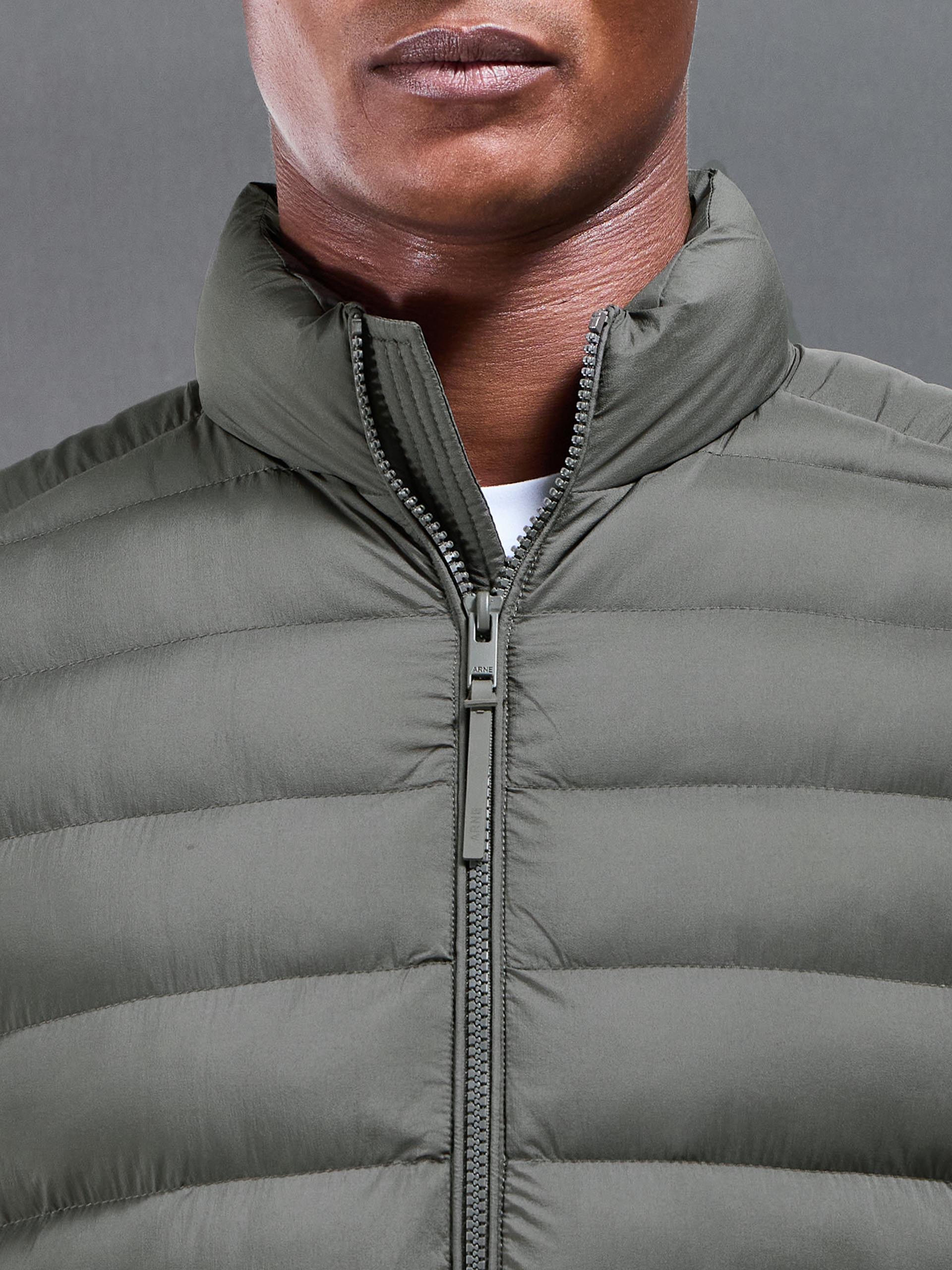 Mens Technical Puffer Gilet in Olive