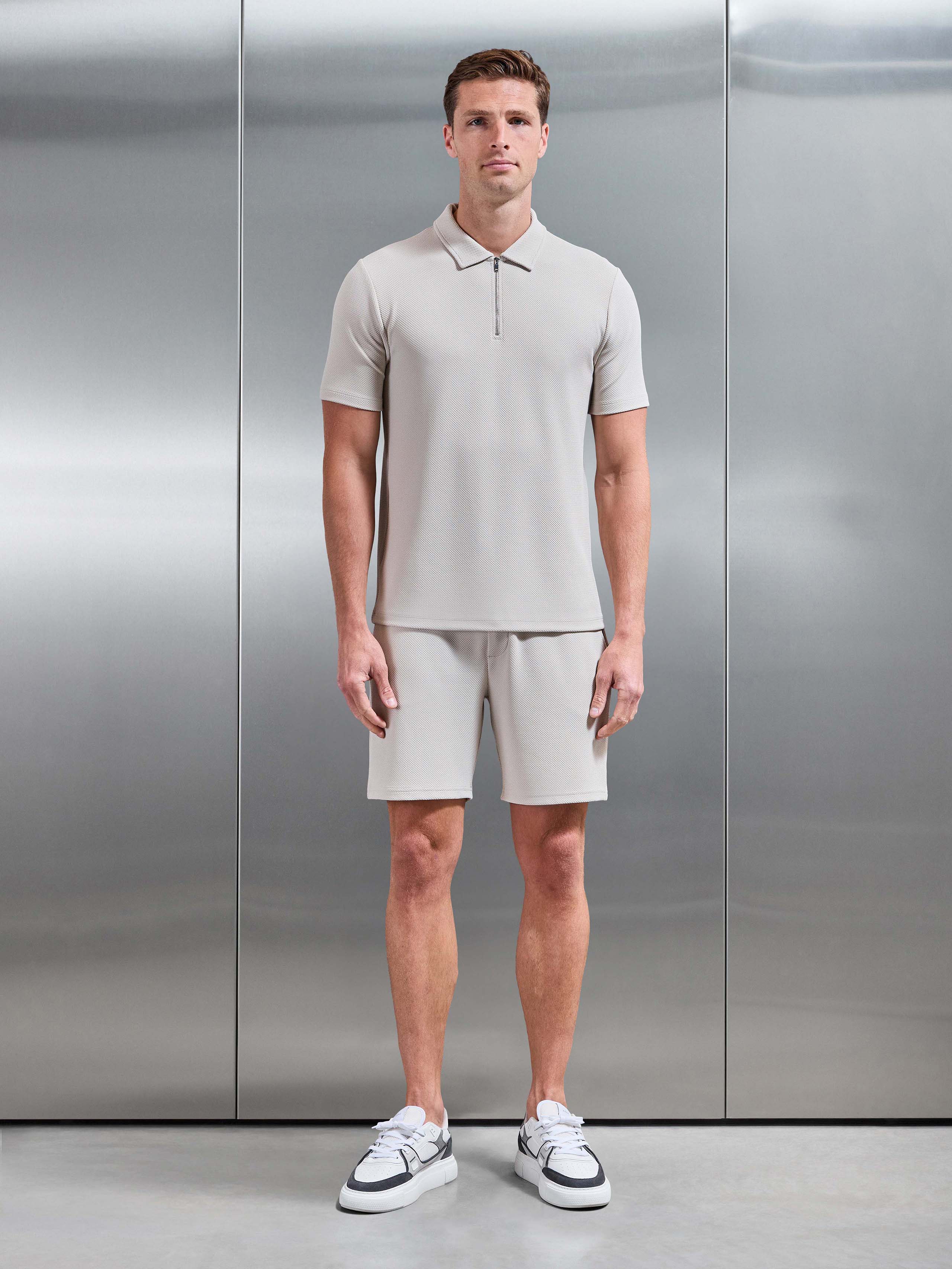 Mens Textured Jersey Zip Polo Shirt in Stone