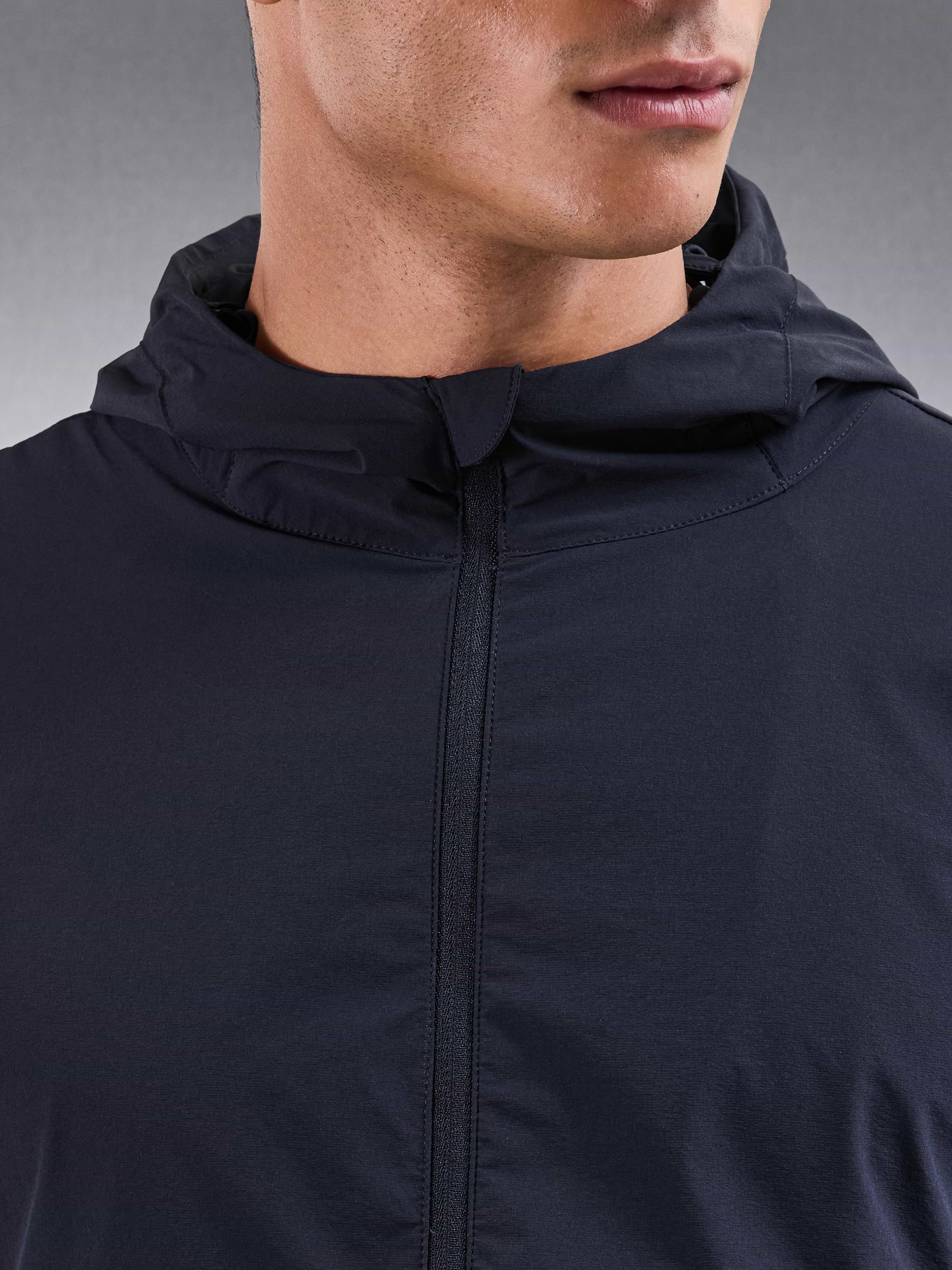 Performance Windbreaker in Navy