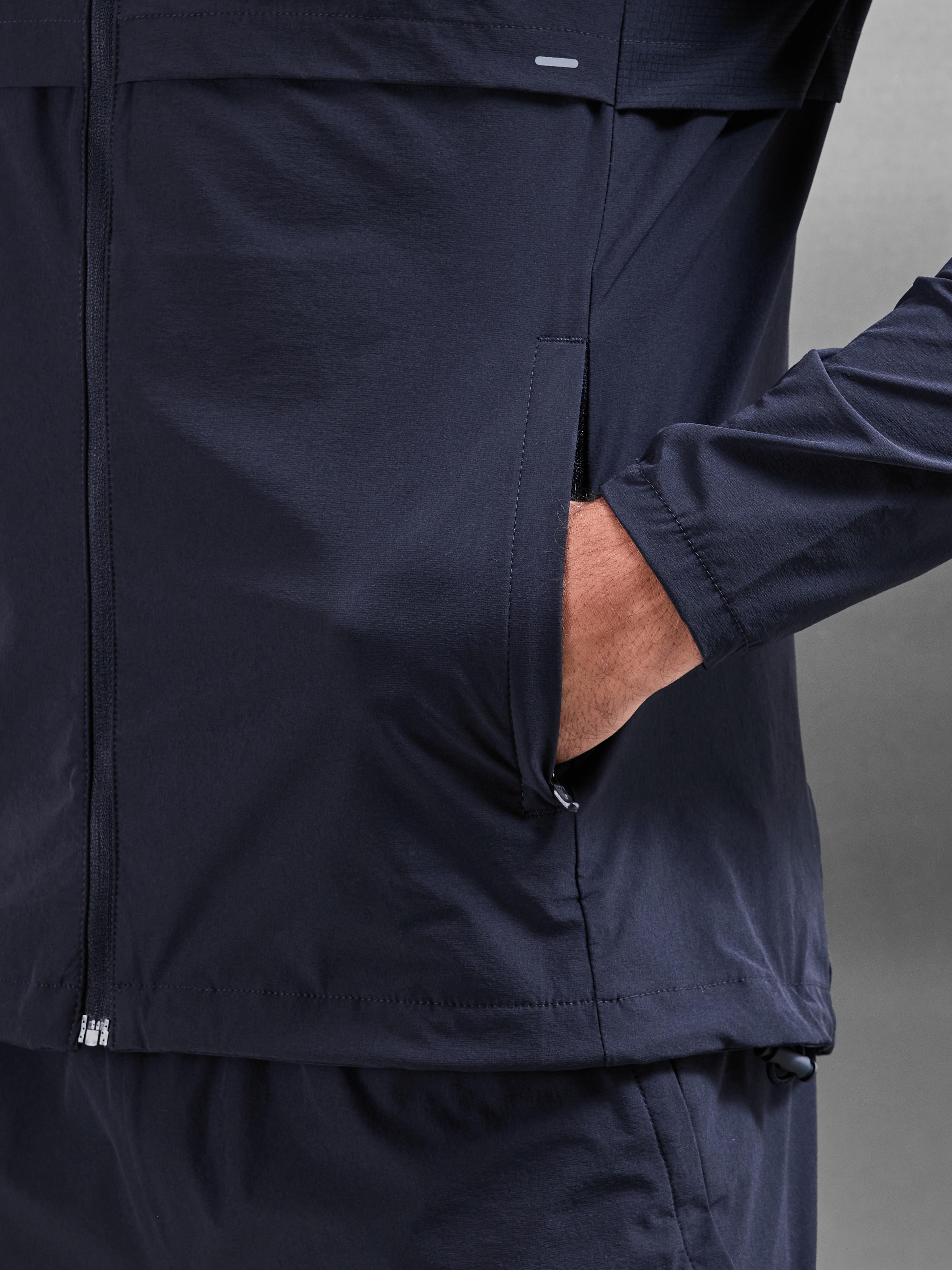 Performance Windbreaker in Navy