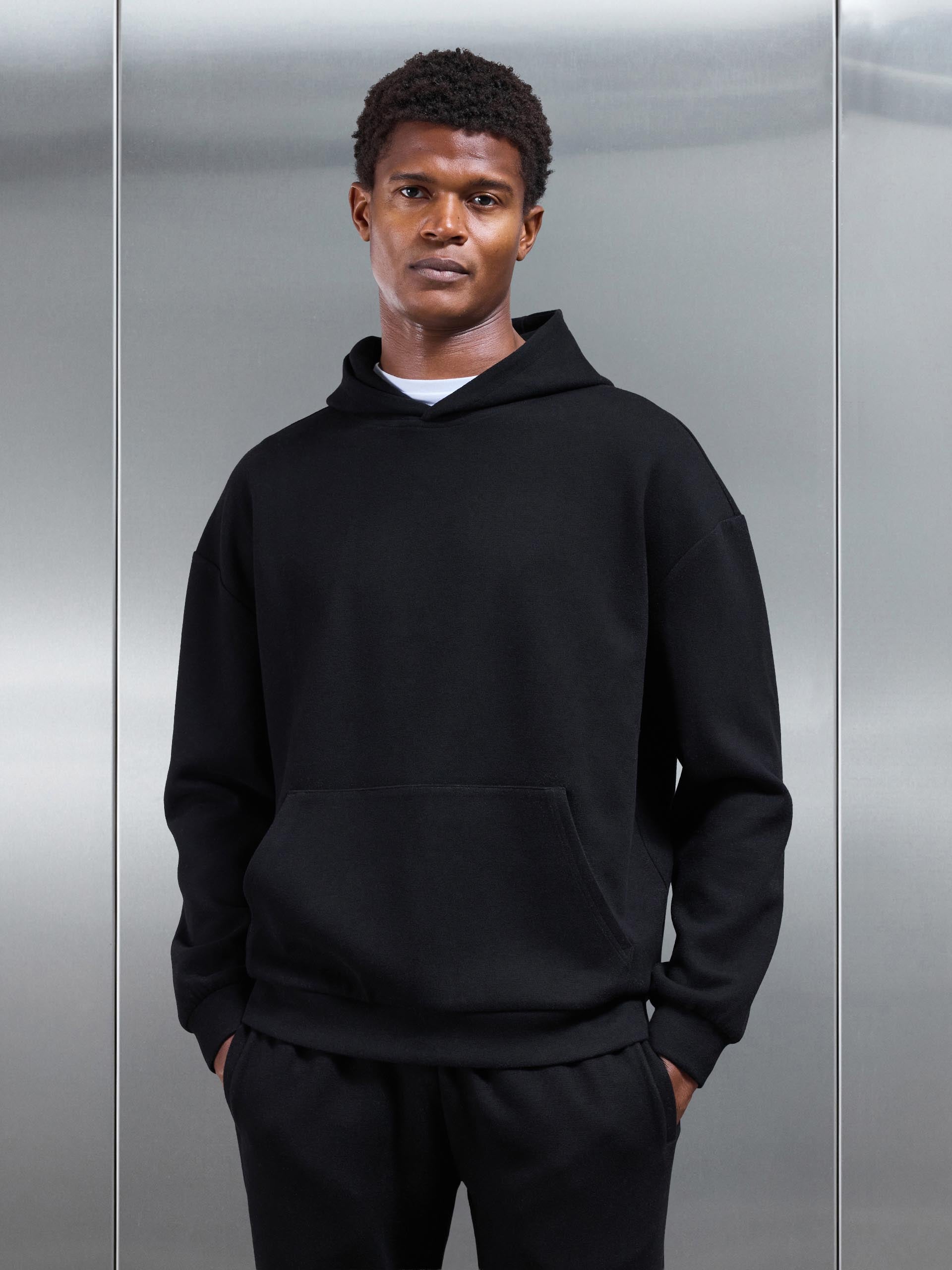 Relaxed Fit Knitted Hoodie in Black