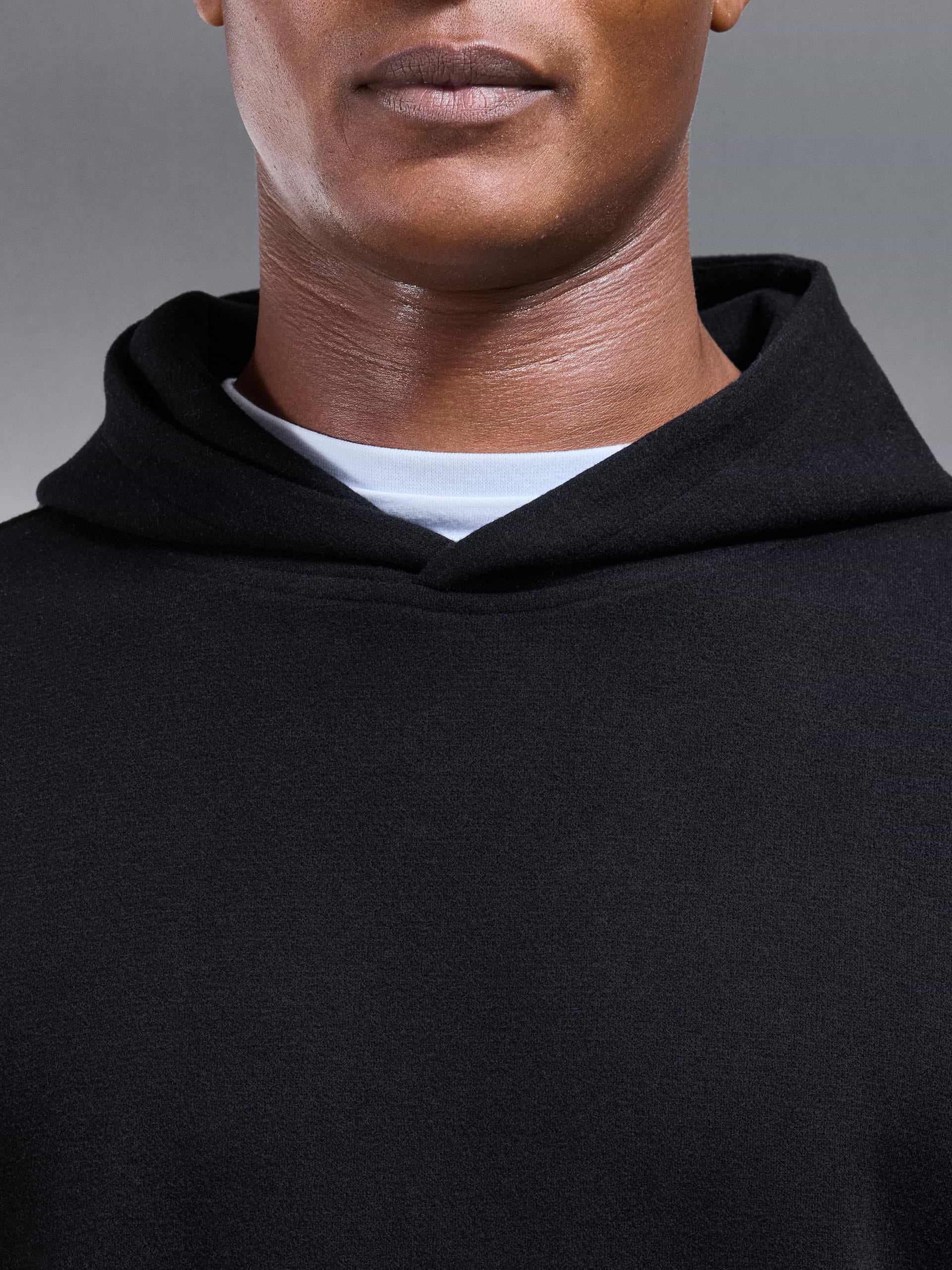 Relaxed Fit Knitted Hoodie in Black