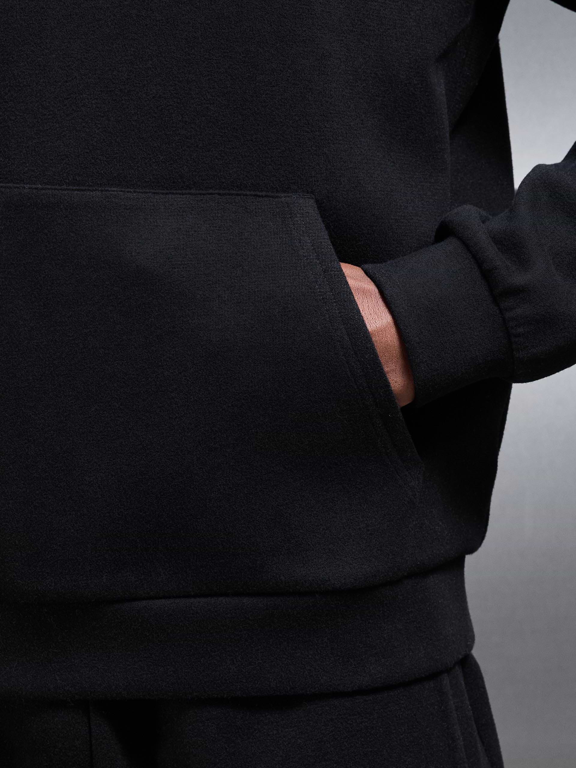 Relaxed Fit Knitted Hoodie in Black