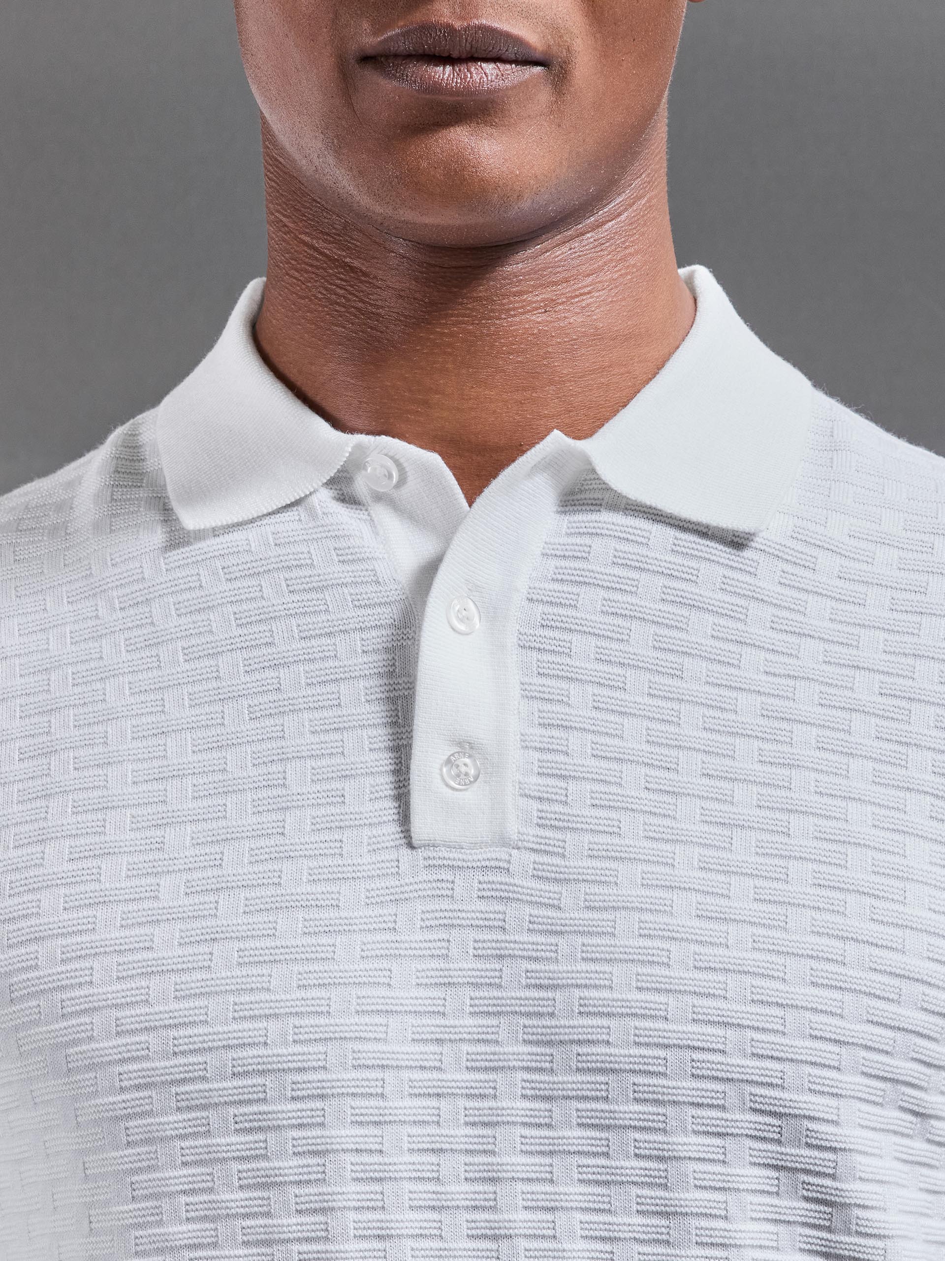 Textured Knitted Polo Shirt in White