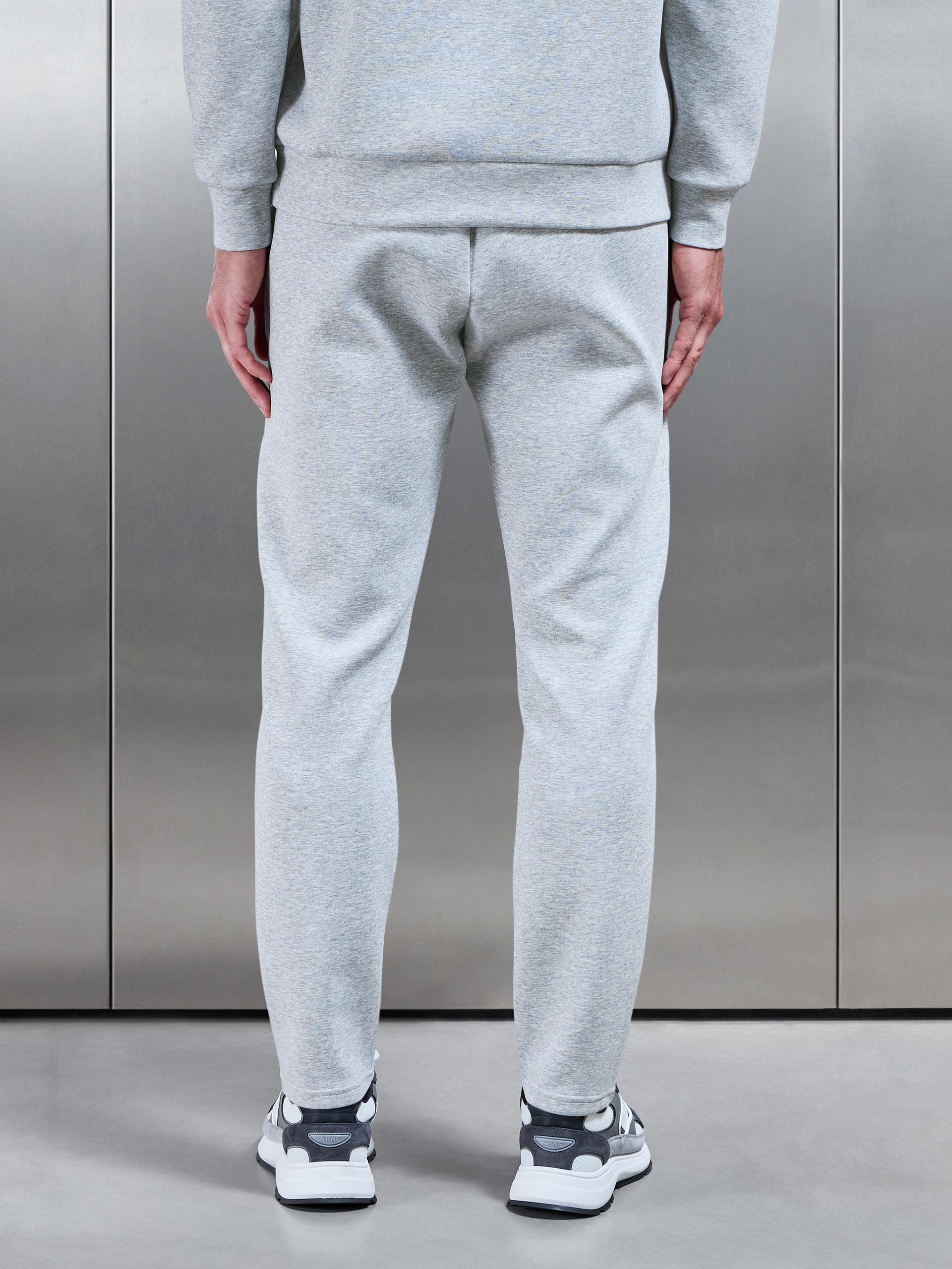 Interlock Jersey Essential Jogger in Marl Grey