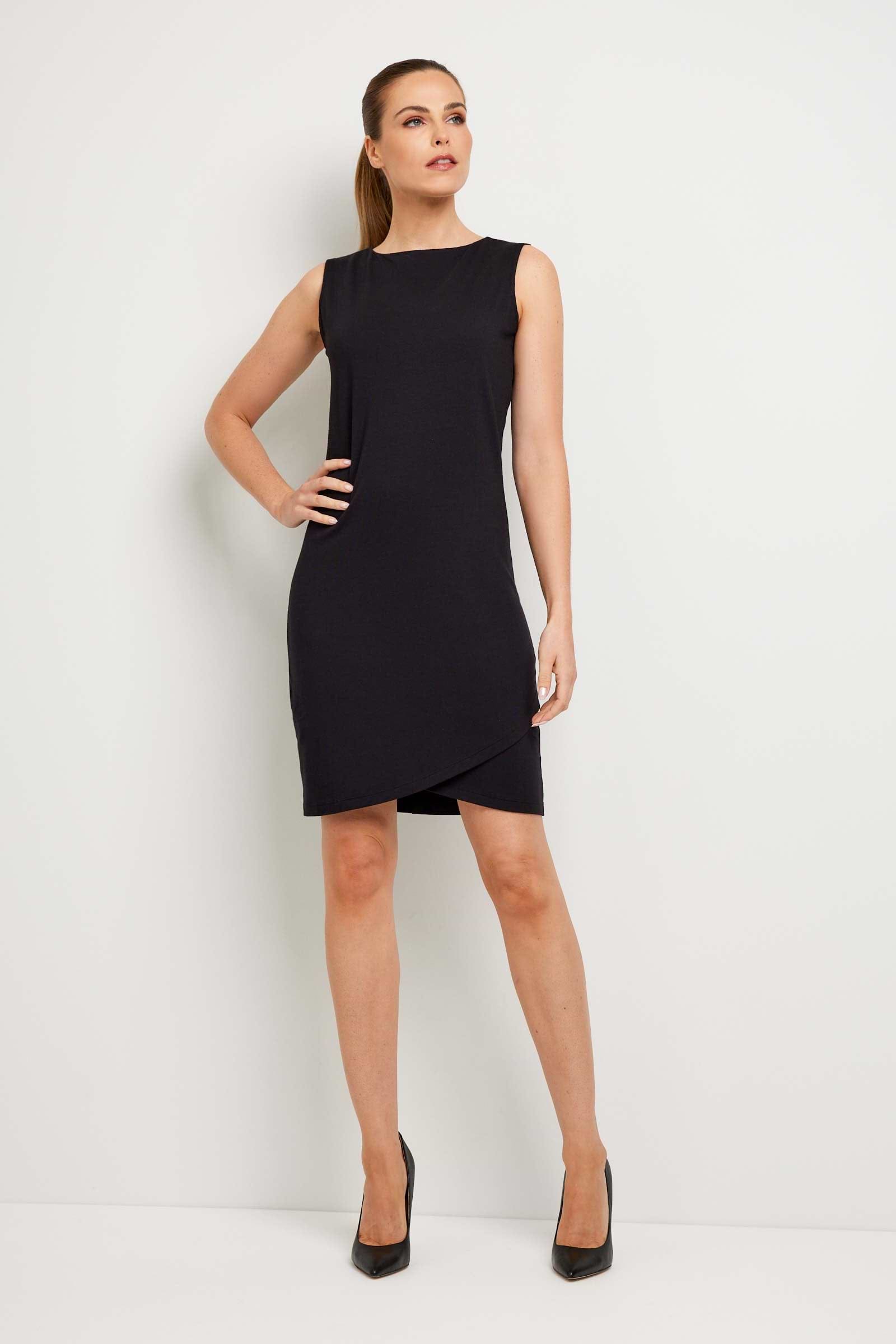 The Best Travel Dress. Woman Showing the Front Profile of a Johanna Dress in Black.