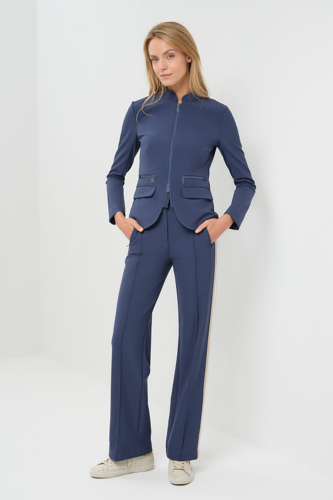 Studio Image of model wearing the Gisela Aeroflow Zip Front Twill Blazer