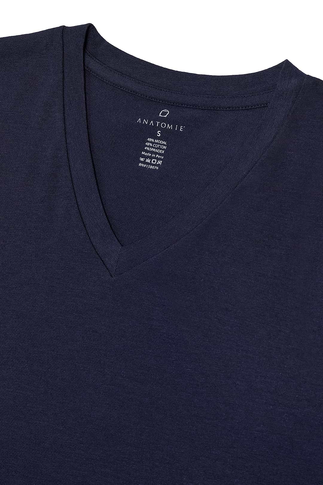 The Best Travel Top. Flat Lay of a Men's Vince Top in Navy.