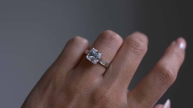 Asscher cut solitaire ring on hand