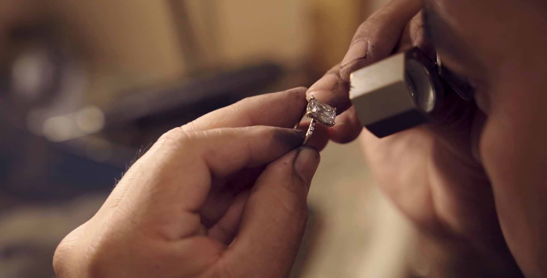 Jeweler Inspecting a Custom Ring