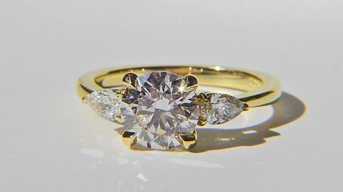 3 Stone Round and Pear Diamond Ring