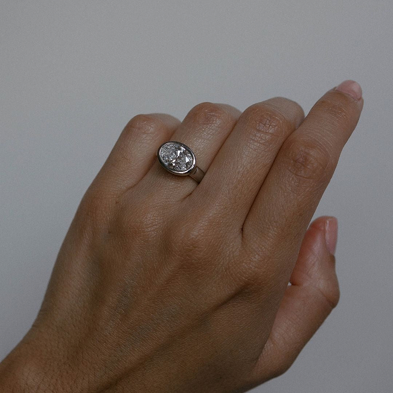 Oval Cut 2.62ct East West Wide Bezel Ring