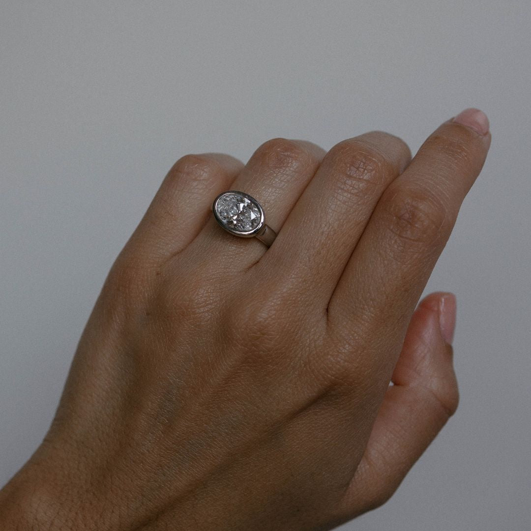 Oval Cut 2.62ct East West Wide Bezel Ring