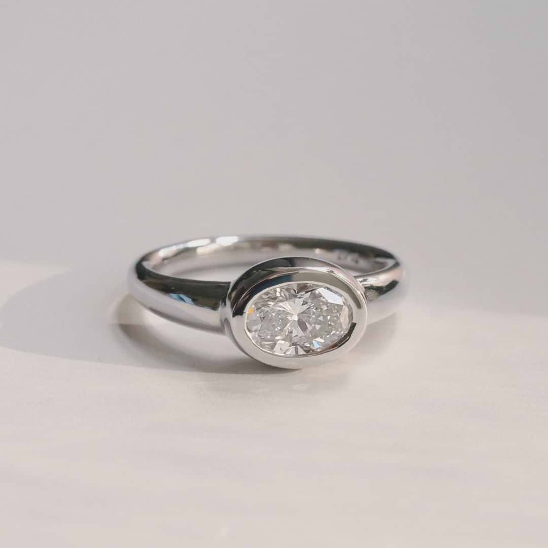 Oval Cut 1.31ct East West Wide Bezel Ring