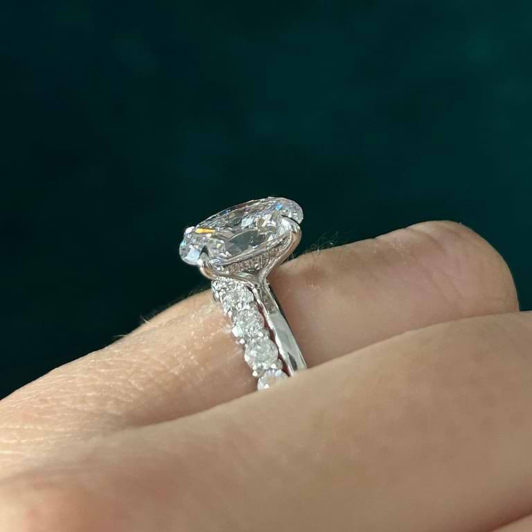 oval hidden halo engagement ring
