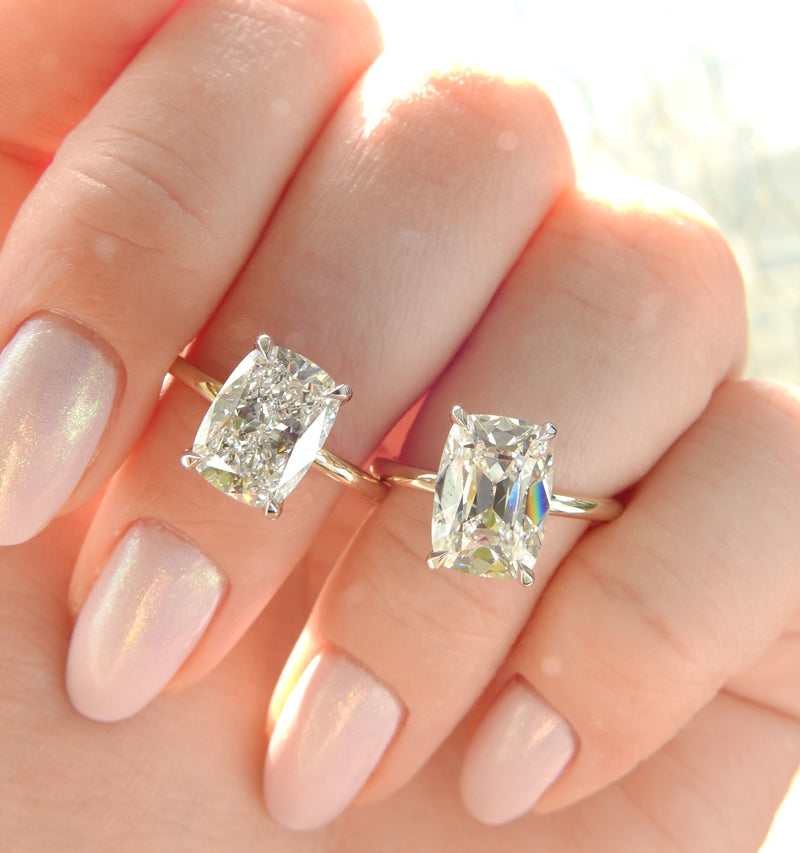 cushion cut and old mine cut rings on hand