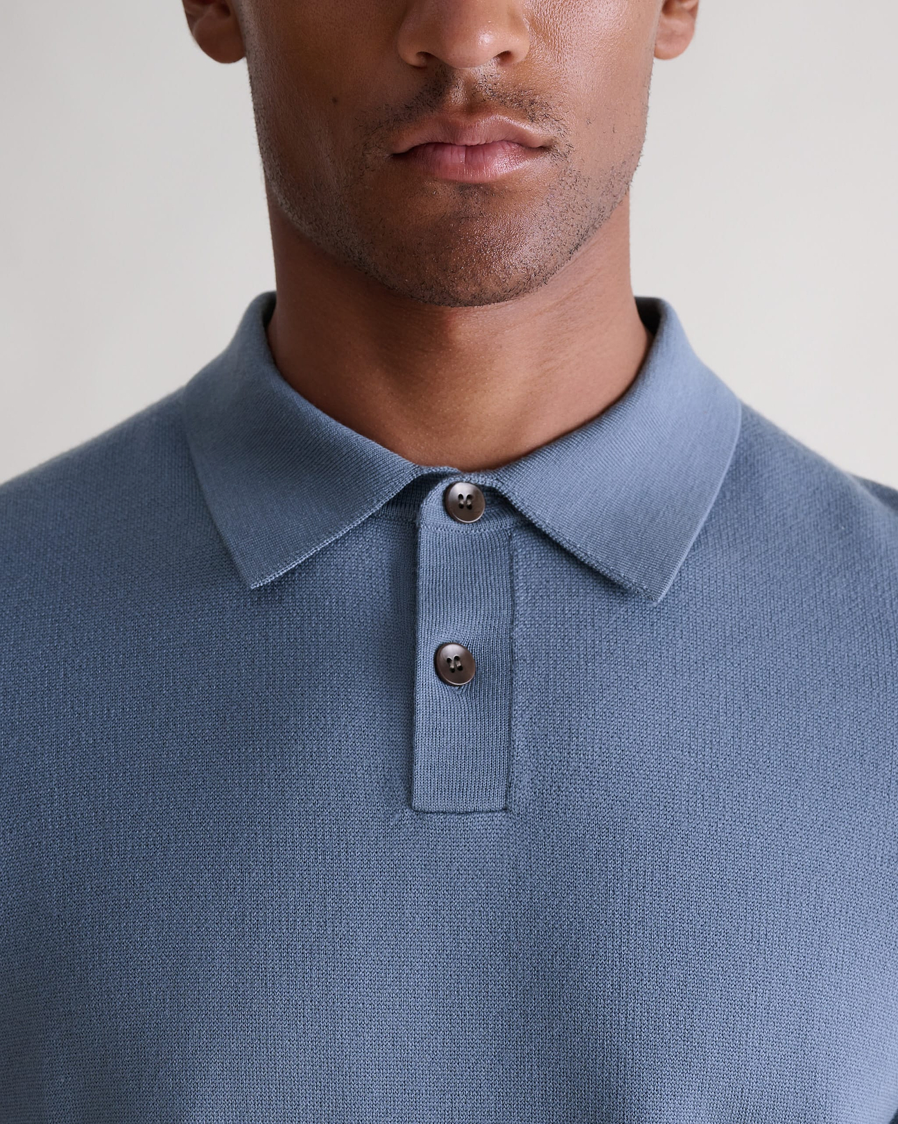 Linked placket with two buttons