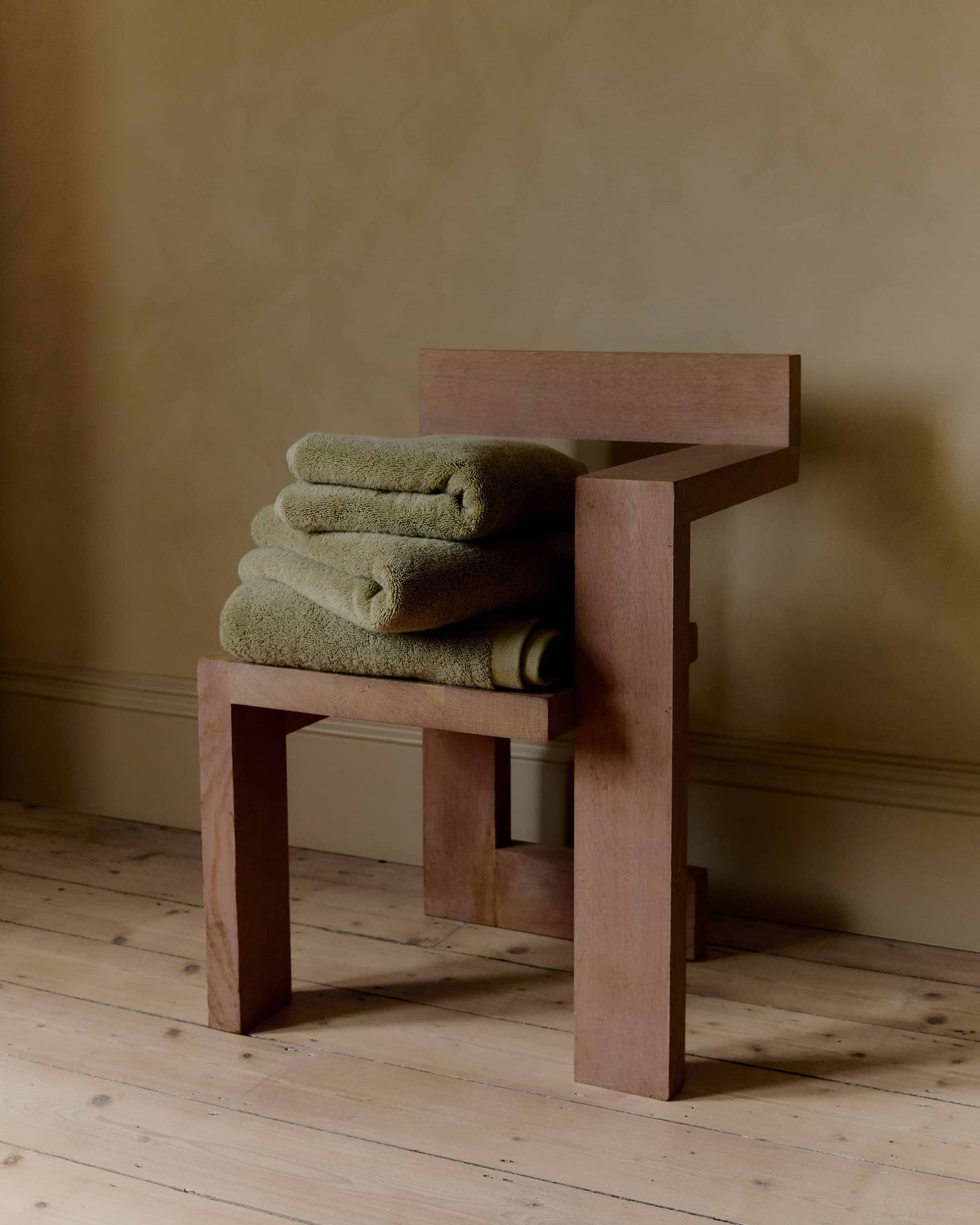 Rise & Fall Turkish cotton towels in sage, styled in a bathroom
