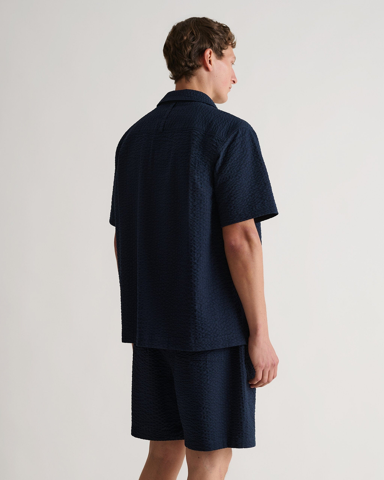 Box pleat at back for volume