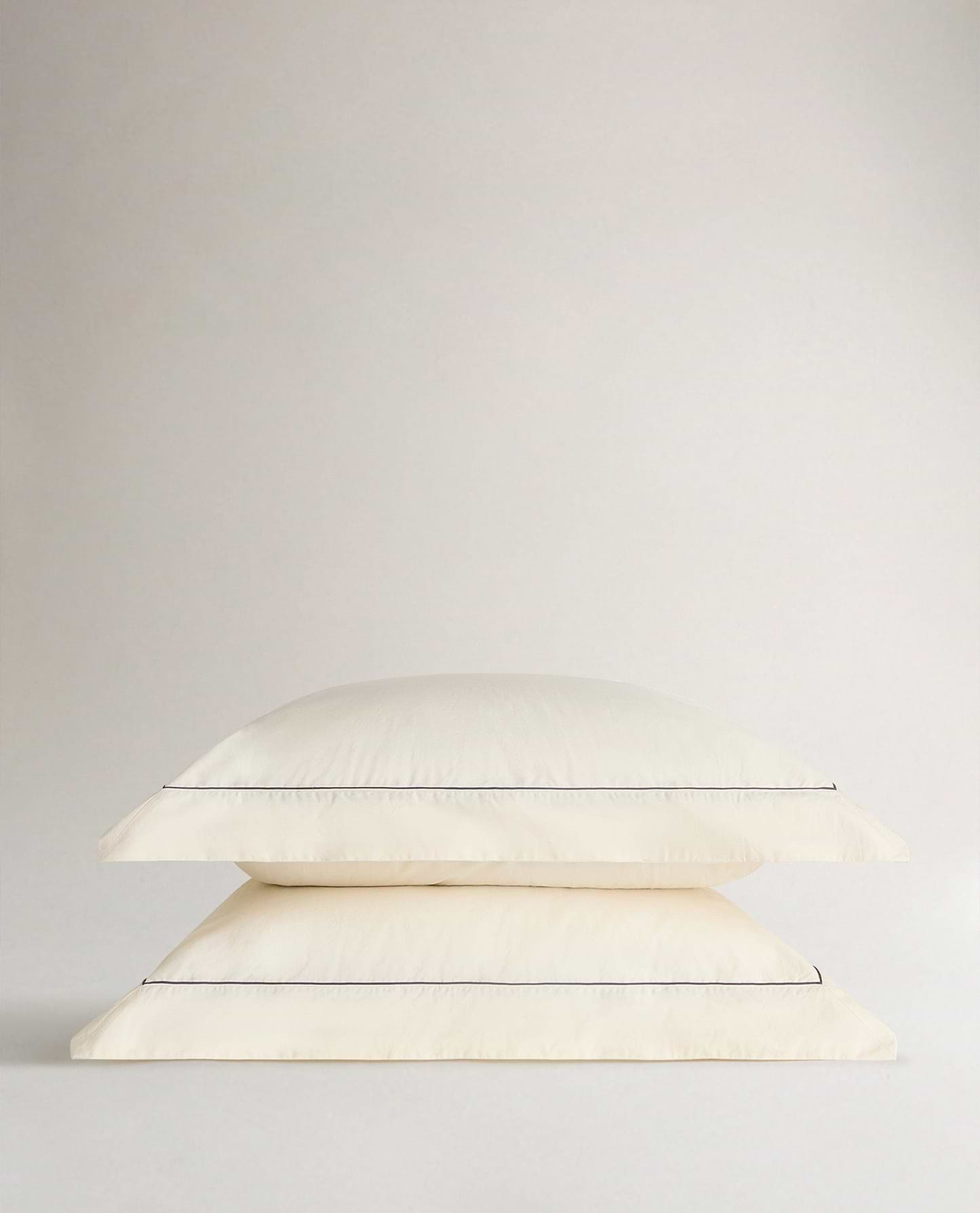 Crisp & Cool Organic Cotton Oxford Pillowcases - Buttermilk Black Piping