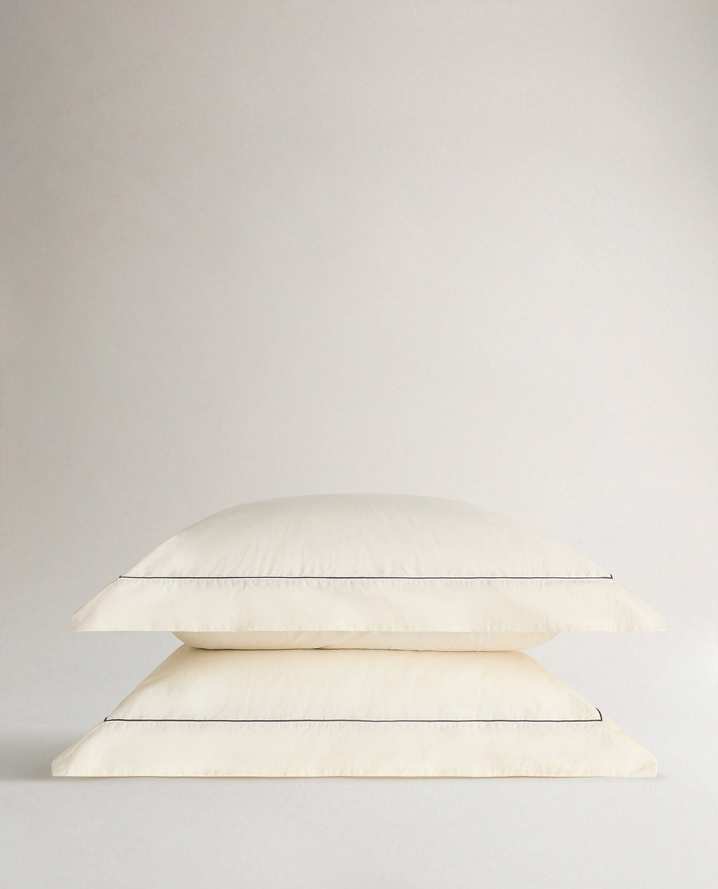 Crisp & Cool Organic Cotton Oxford Pillowcases - Buttermilk Black Piping