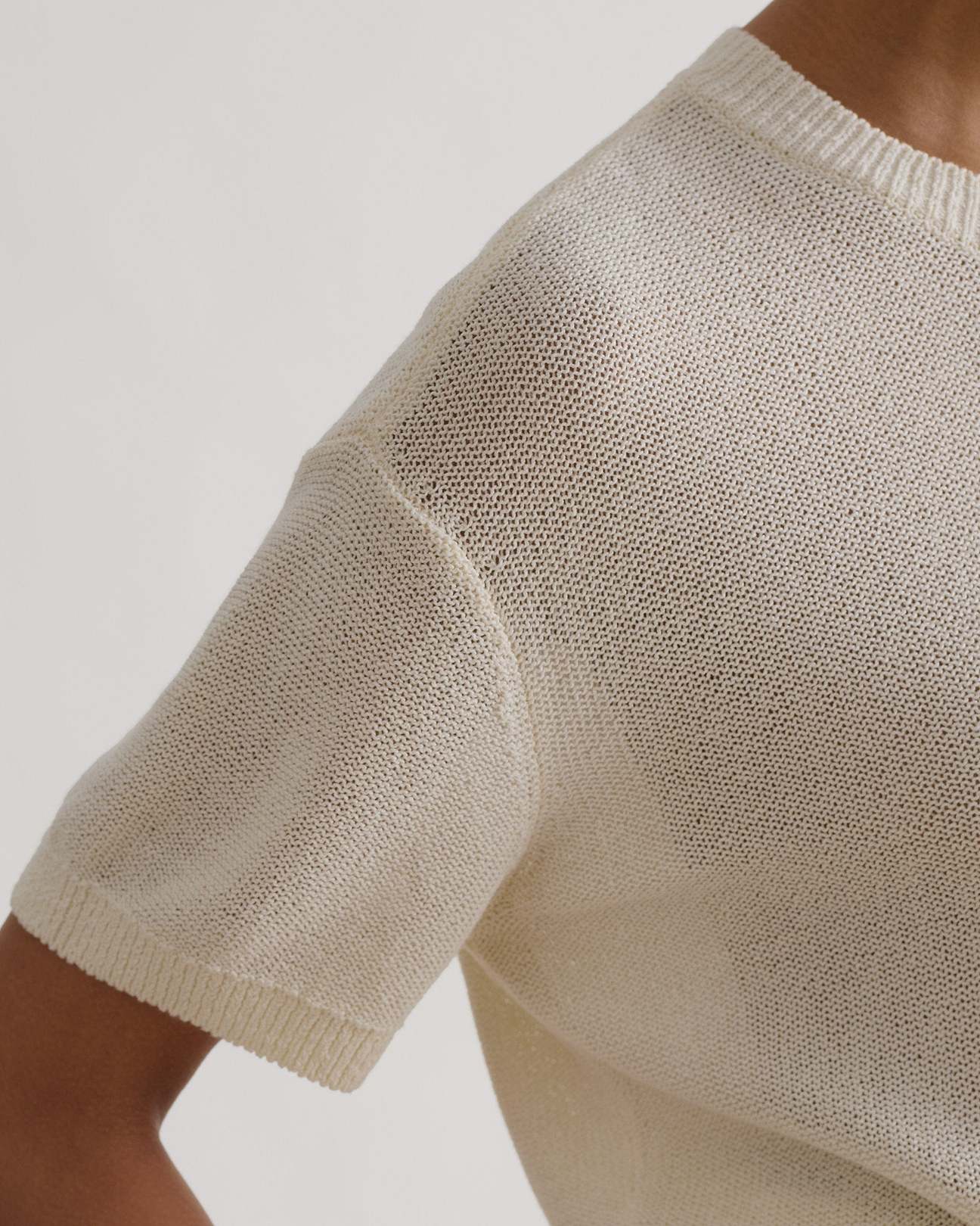 Textured reverse knit surface