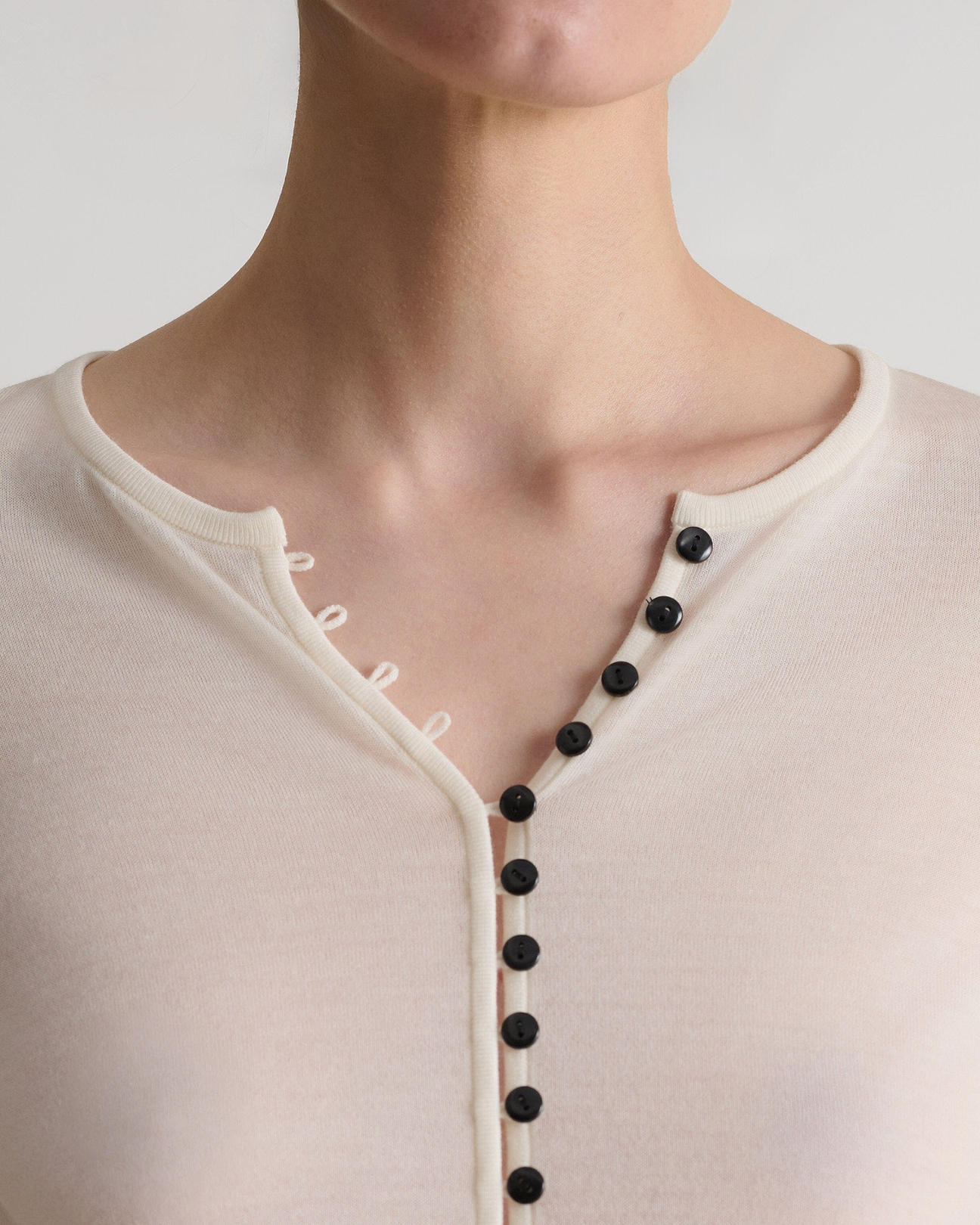 Handsewn contrast buttons