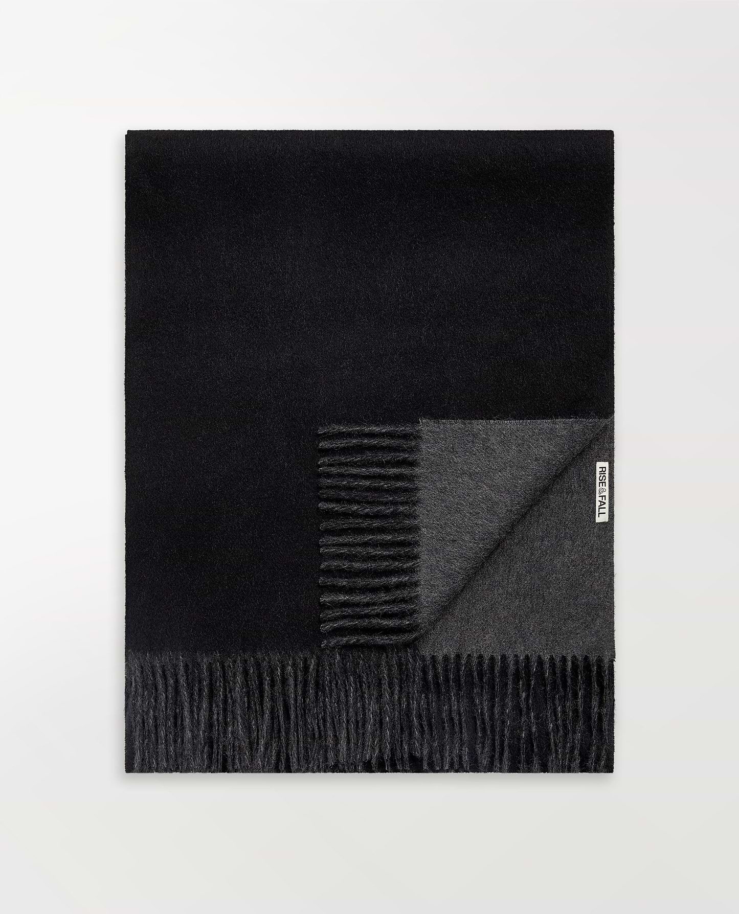 Image 1 of 2 showing Rise & Fall's finest cashmere double faced wrap, colour: black and charcoal.