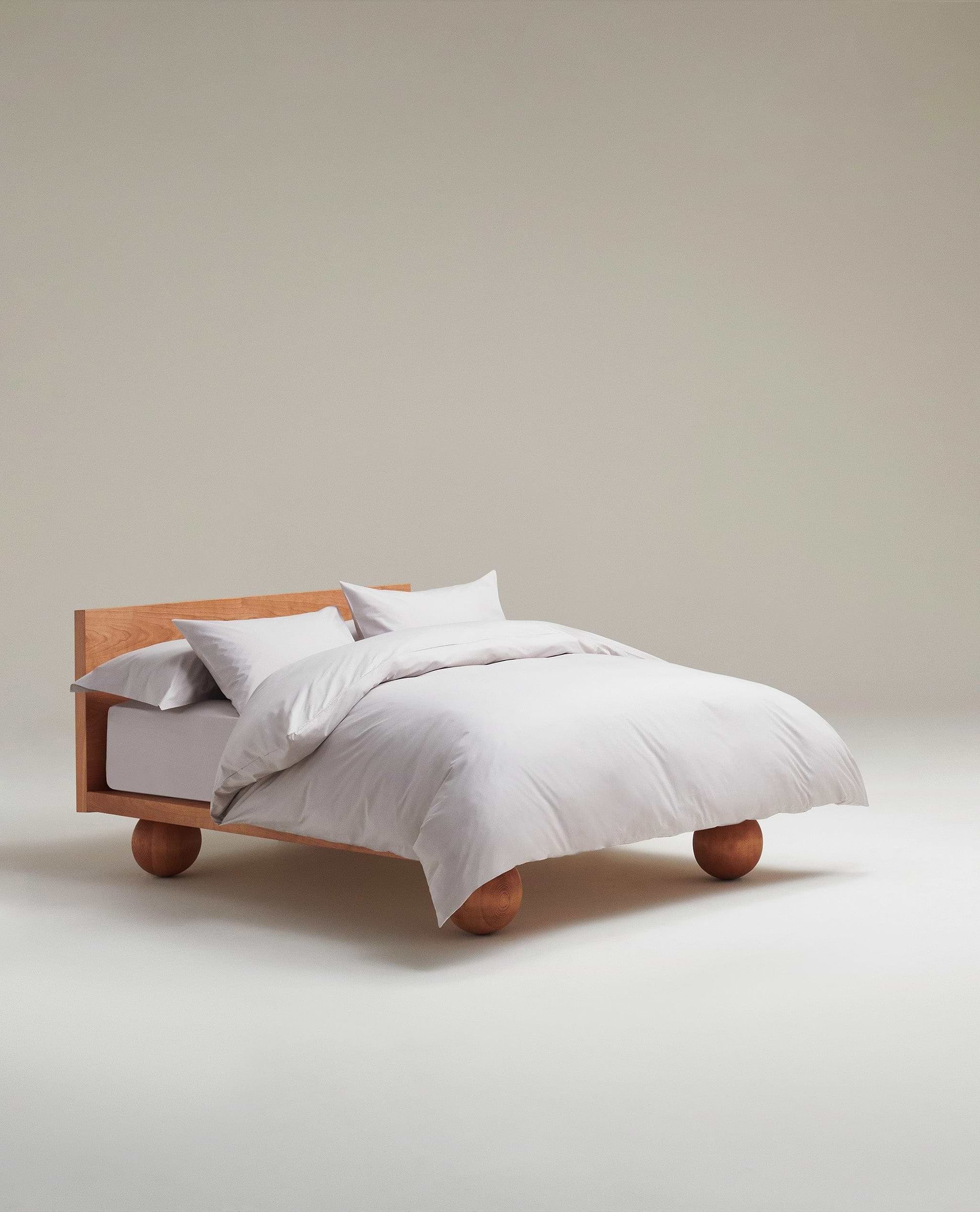 Image 1 of 3 showing Rise & Fall's percale cotton duvet cover, colour: pebble.