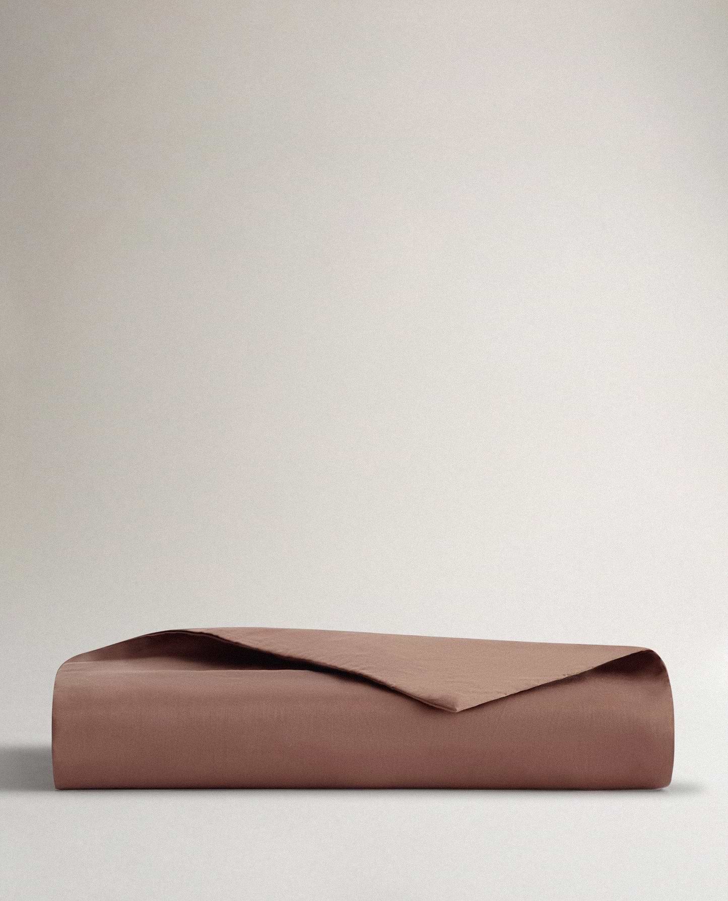 Image 1 of 3 showing Rise & Fall's sateen cotton duvet cover, colour: deep clay.