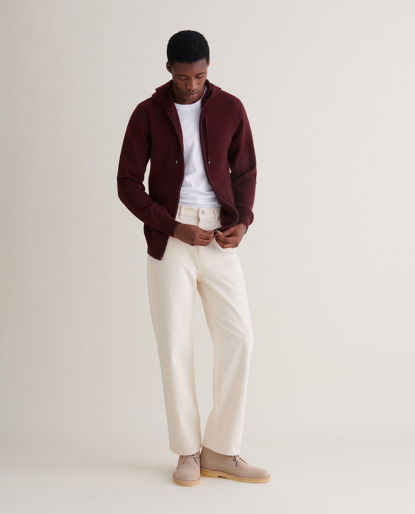 Image 1 of 4 showing man wearing Rise & Fall's  Finest Cashmere Full Zip Hoodie in Oxblood.