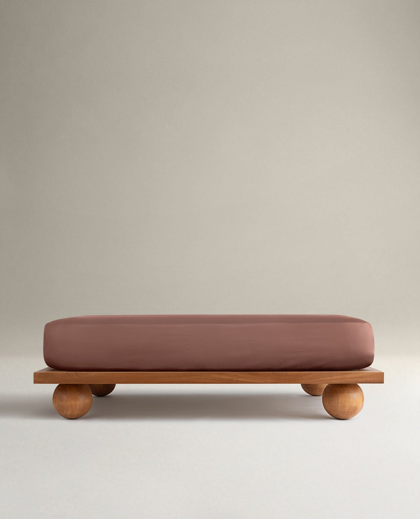 Image 1 of 5 showing Rise & Fall's Soft & Smooth sateen cotton deep fitted sheet in clay.
