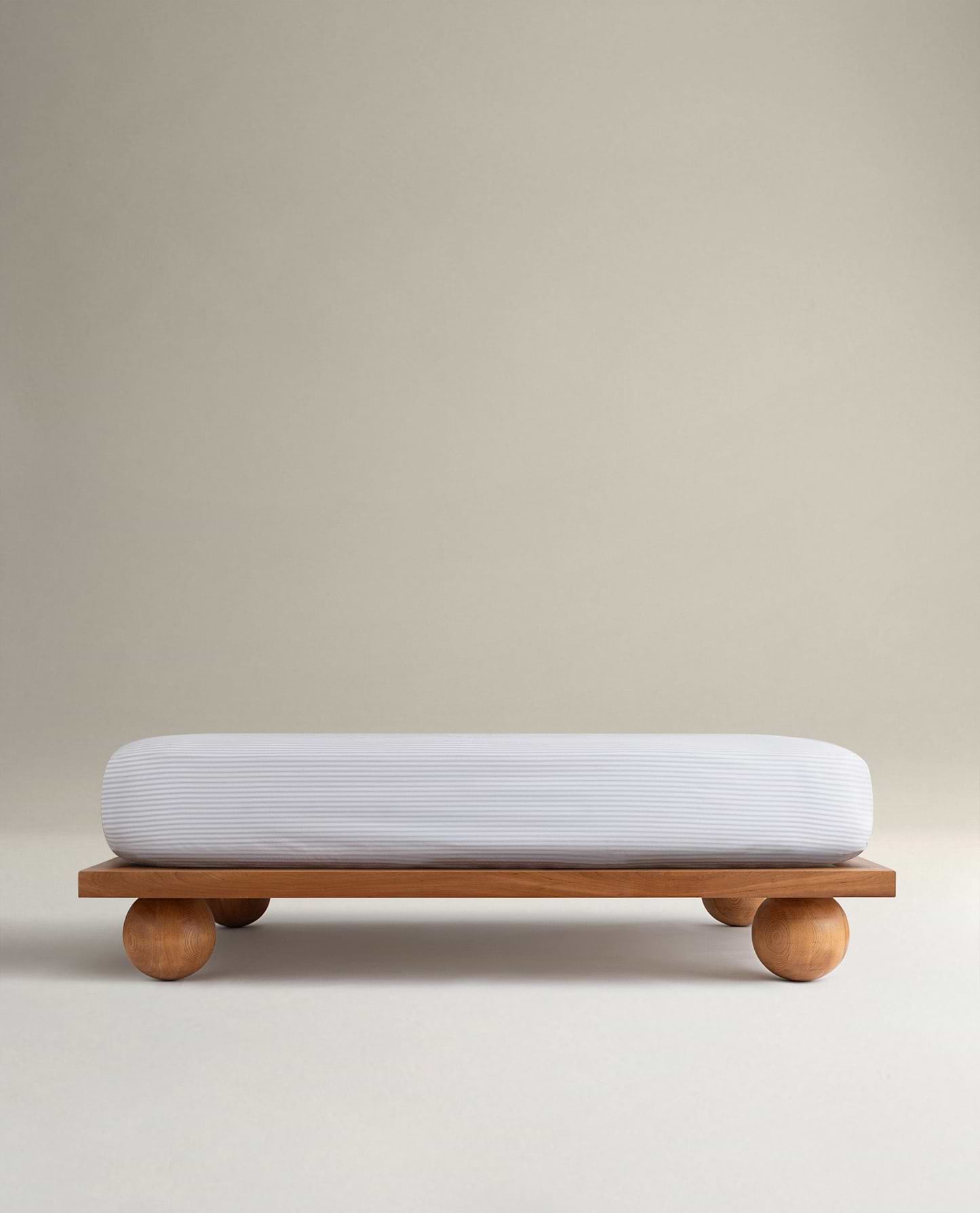 Image 1 of 6 showing Rise & Fall's Crisp & Cool organic cotton fitted sheet in blue stripe ticking.