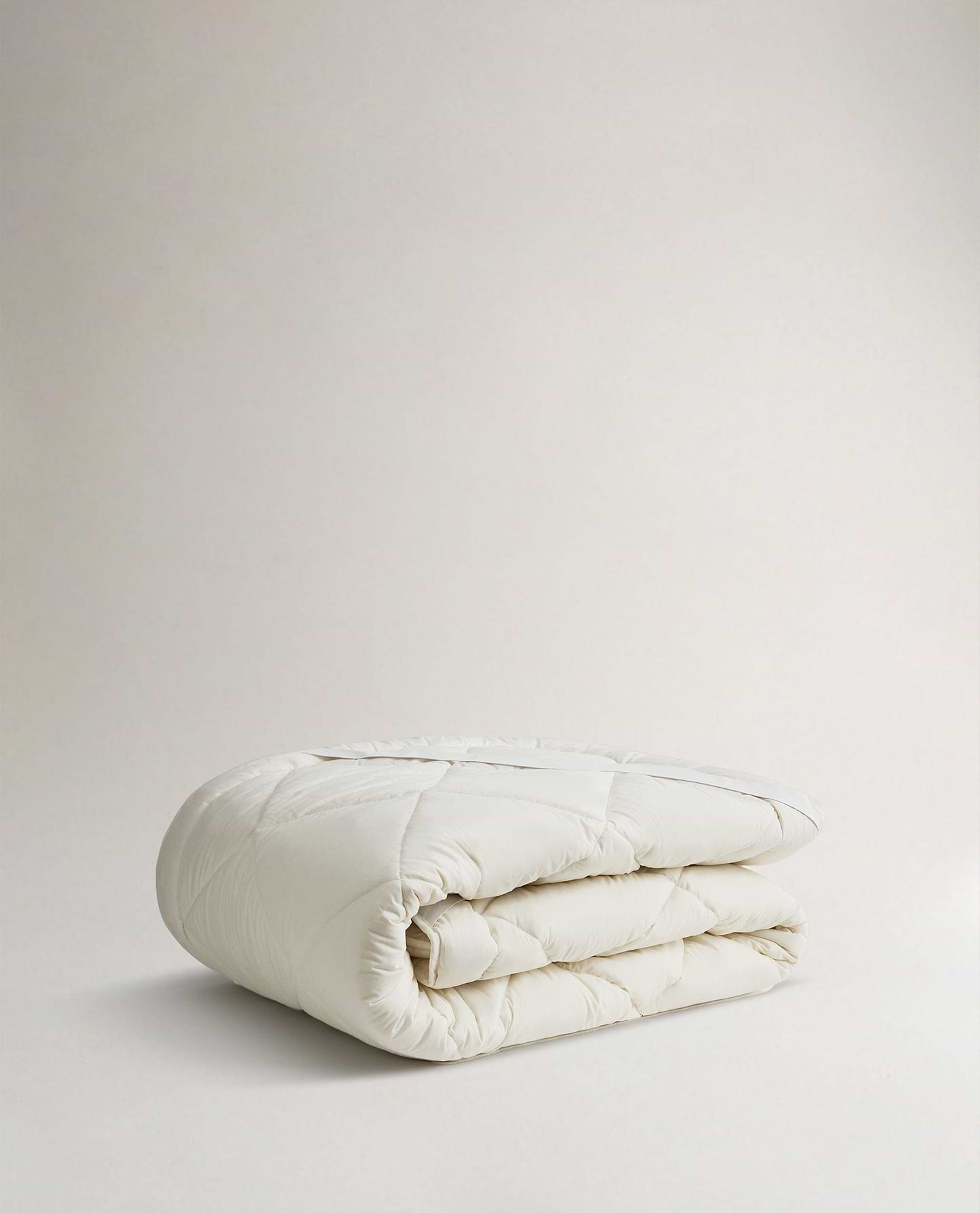 Image 2 of 2 showing Rise & Fall's certified British Wool Mattress Topper.